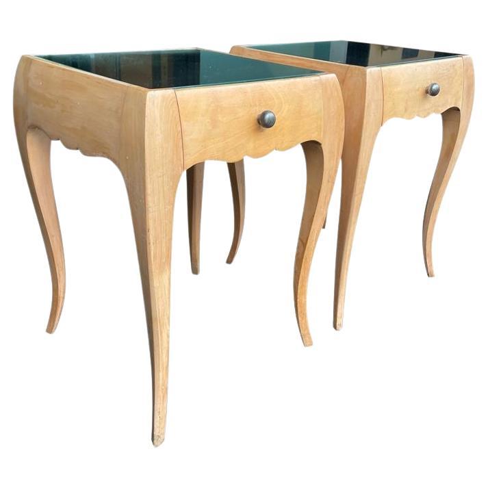 A lovely pair of 1930s sycamore bedside tables by René Prou with shaped legs For Sale