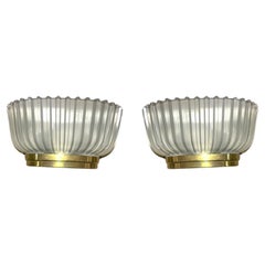 A lovely pair of 1940s opaque Murano glass ribbed wall sconces by Seguso