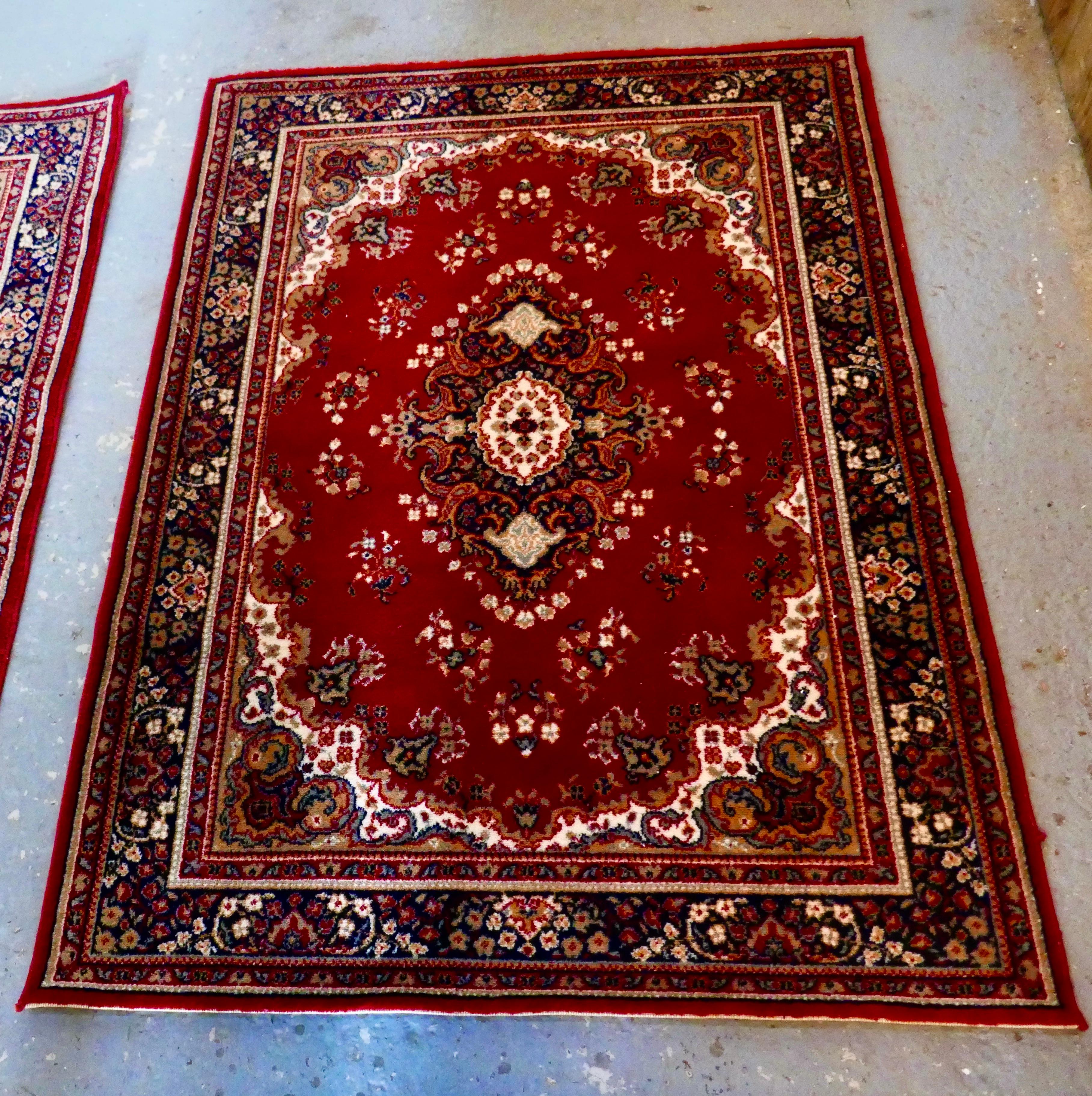 British Colonial Lovely Pair of Bright Red Wool Rugs For Sale