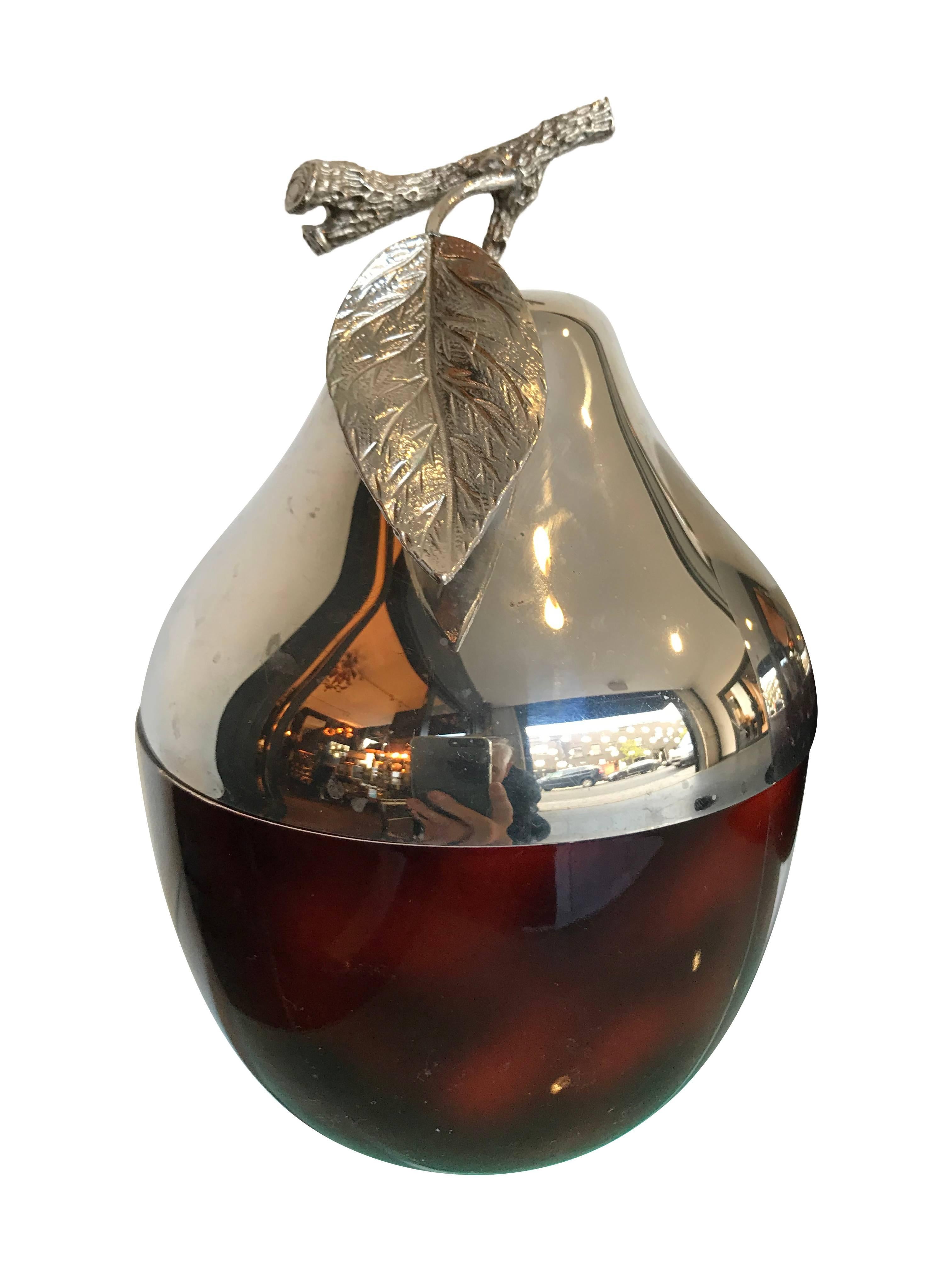 A lovely pear shaped ice bucket, with chrome top with detailed stalk and leaf handle, on a faux tortoise shell, acrylic base.