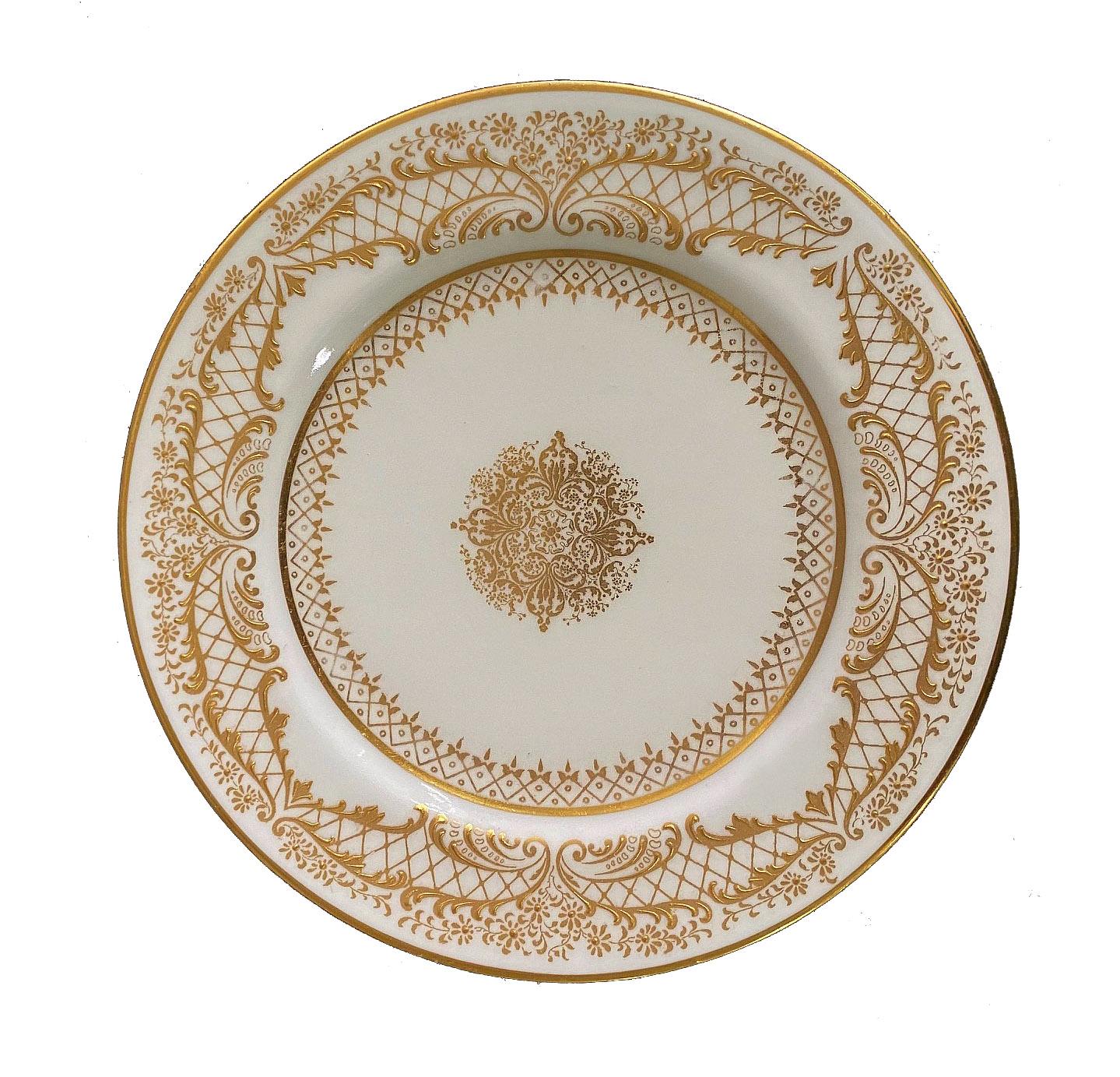 A lovely set of fourteen early 20th century English Royal Doulton bread plates

Finely decorated with raised gold.

Stamped Royal Doulton England and Gilman Collamore & Co. on the back of the plates.