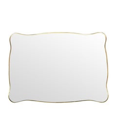 A lovely shaped, landscape / portrait, orignal Italian 1950s brass framed mirror