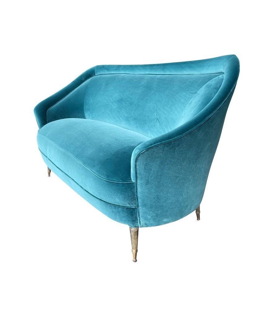 Brass A lovely shaped orignal Italian 1950s two seater sofa with curved back For Sale