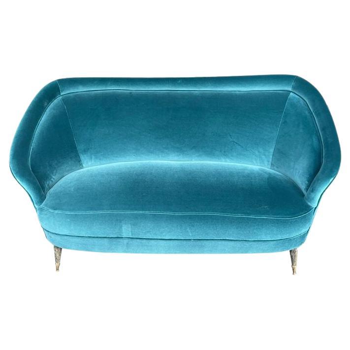 A lovely shaped orignal Italian 1950s two seater sofa with curved back For Sale
