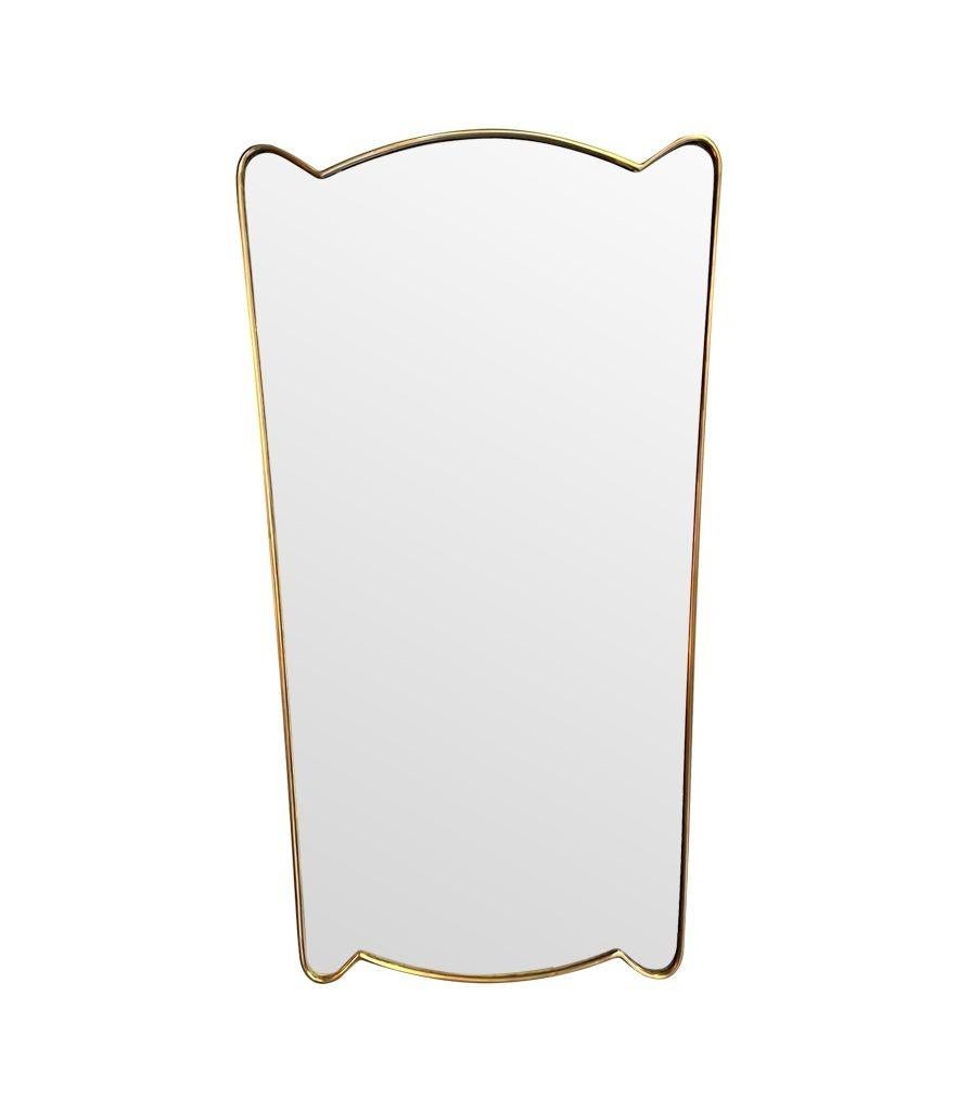 Mid-Century Modern A lovely unique shaped orignal 1950s Italian shield mirror with solid wood back For Sale
