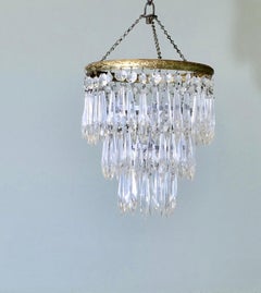 A Lovely Waterfall 3 Tier Crystal Chandelier  This Charming waterfall tiered pen