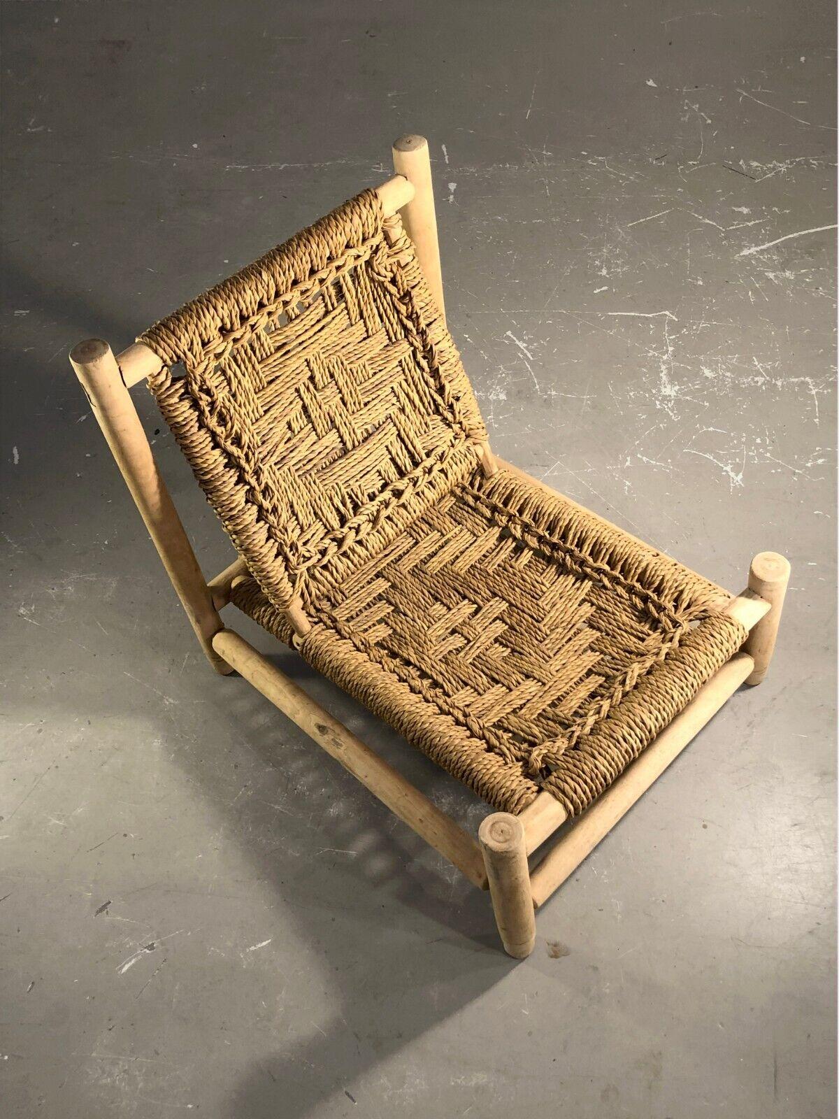 French A RUSTIC-MODERN BRUTALIST ARMCHAIR by Adrien AUDOUX & Frida MINNET, France 1950 For Sale
