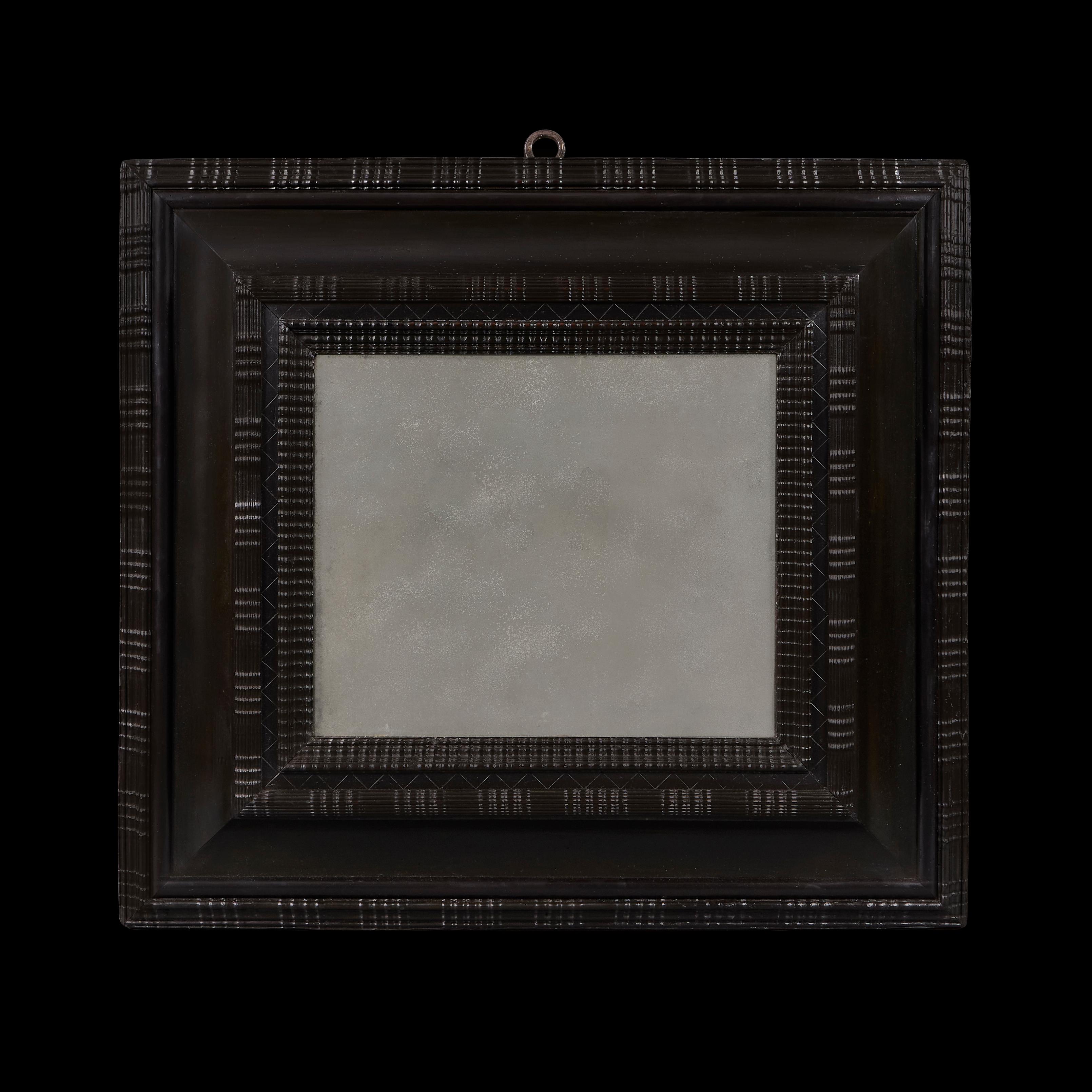 Low Countries, circa 1780

A fine late eighteenth century solid ebony deep cushion mirror frame, with ripple moulding throughout, exaggerated outer frame, original wrought iron hanging hook, with mercury mirror plate.

Height    84.00cm
Width    