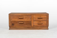 A Low Teak Wood Four Drawer Chest