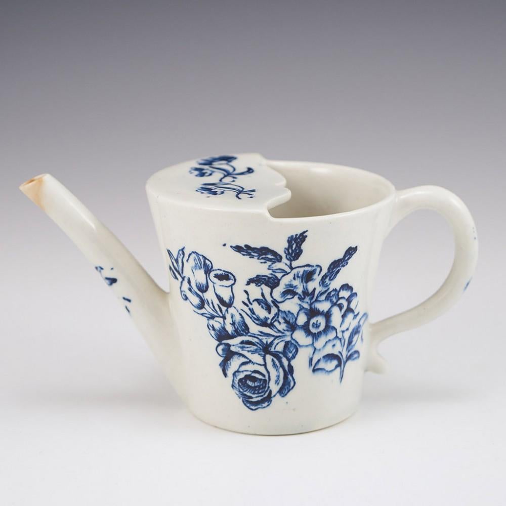 Heading :A Lowestoft Porcelain Feeding Cup 
Date : 1770-1780
Period : George III
Marks :None
Origin :Lowestoft, Suffolk
Colour :Blue and white
Pattern : Blue transfer printed Rose and mixed flower spray with butterfly
Features :Loop handle and