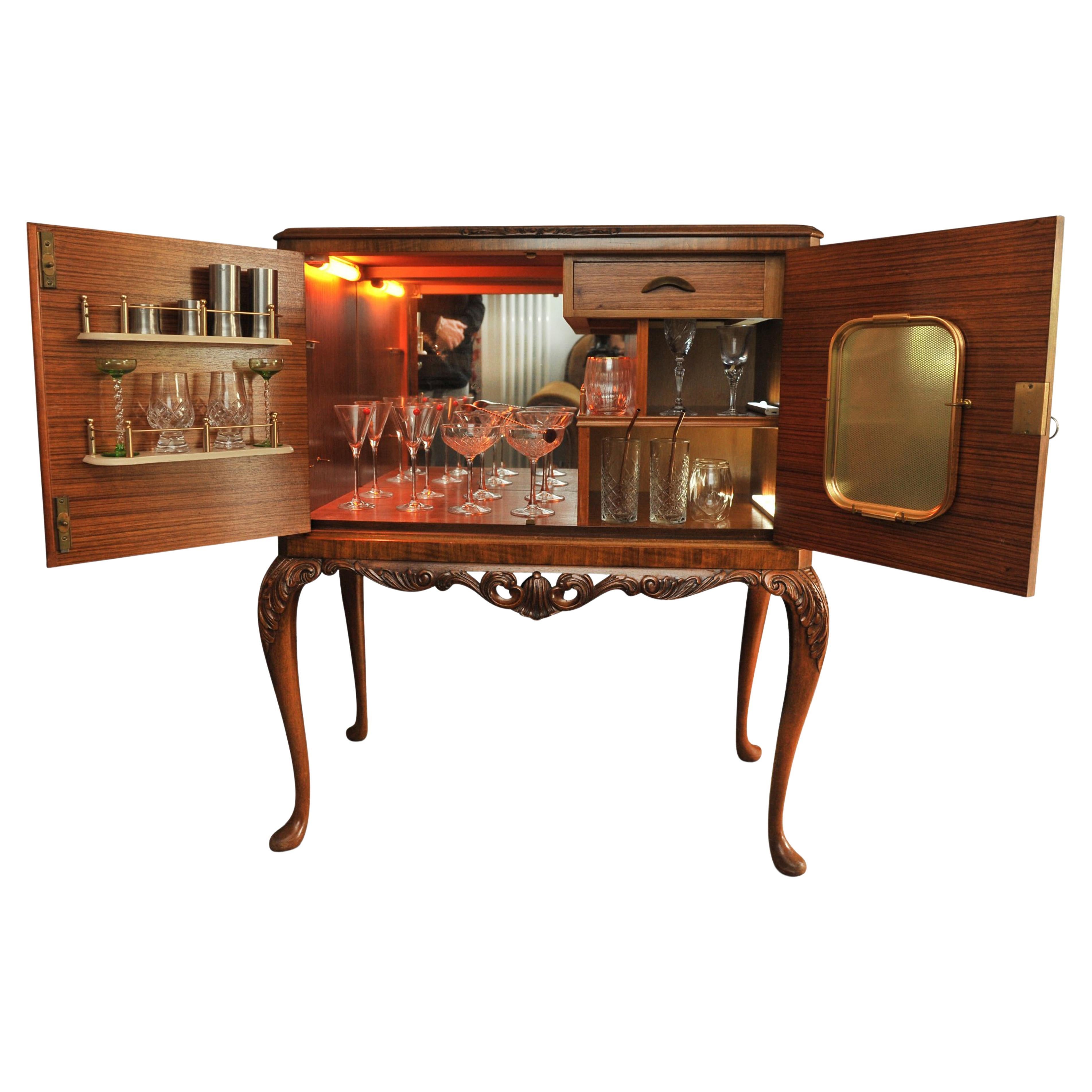 A Luxurious Burr Walnut Cocktail Cabinet With Light & Fitted Mirrored Interior 