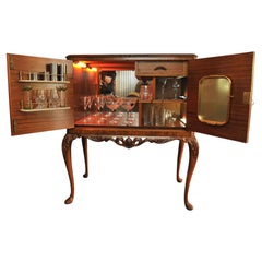 A Luxurious Burr Walnut Cocktail Cabinet With Light & Fitted Mirrored Interior 