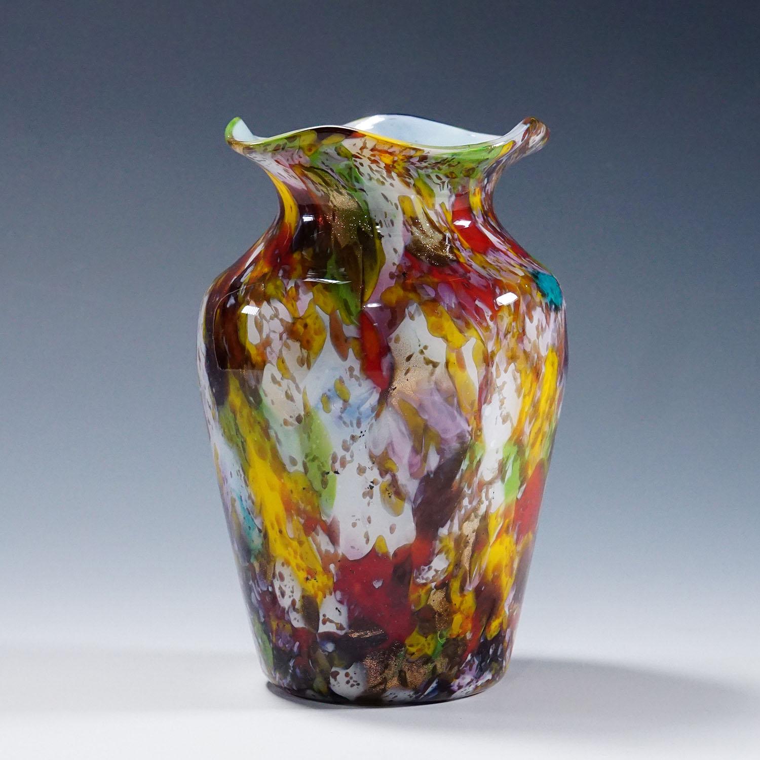 A Macchie Art Glass Vase by Artisti Barovier Attribution, Murano ca. 1920s

A rare Murano art glass vase manufactured most probably by Artisti Barovier around 1920s. Thin opaque white glass with multicoloured glass and aventurine inclusions
