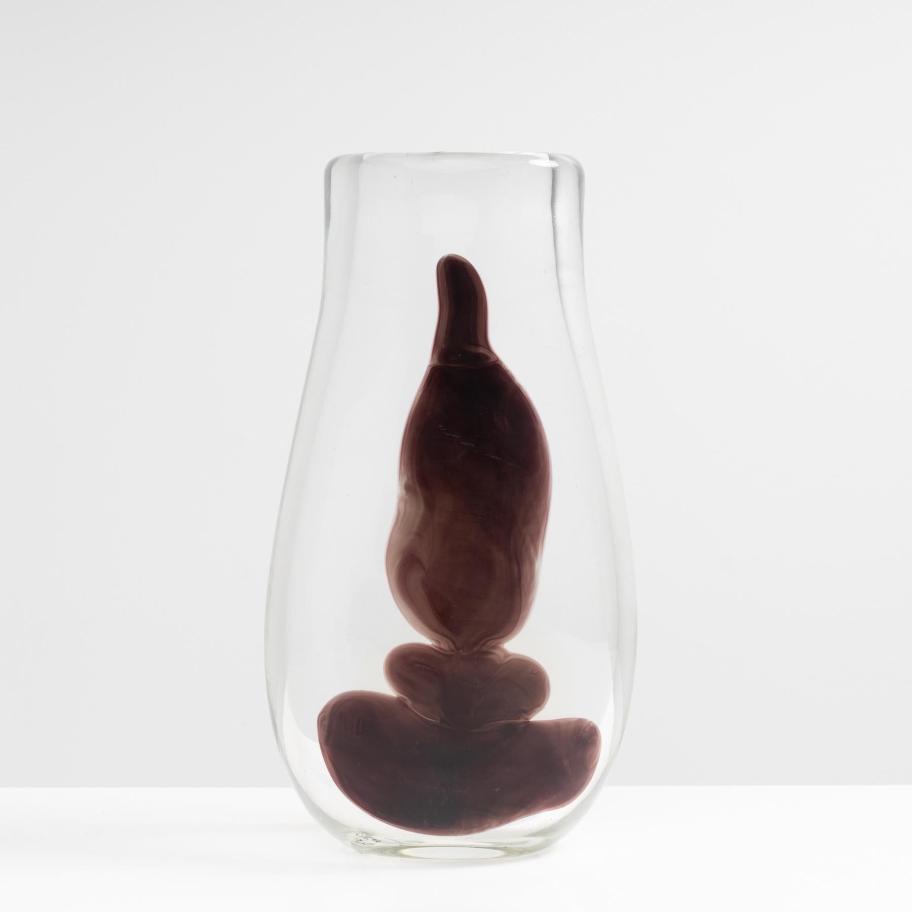 Vase in thick transparent glass, one side of the vase decorated with a 
