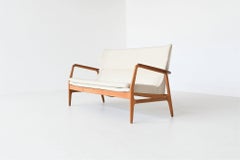 A. Madsen & H. Schubell Wingback sofa in cream Bovenkamp The Netherlands 1960