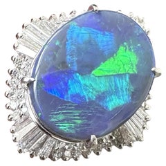 A Magnificent 11.71ct Australian Black Opal & Diamond Platinum Ring