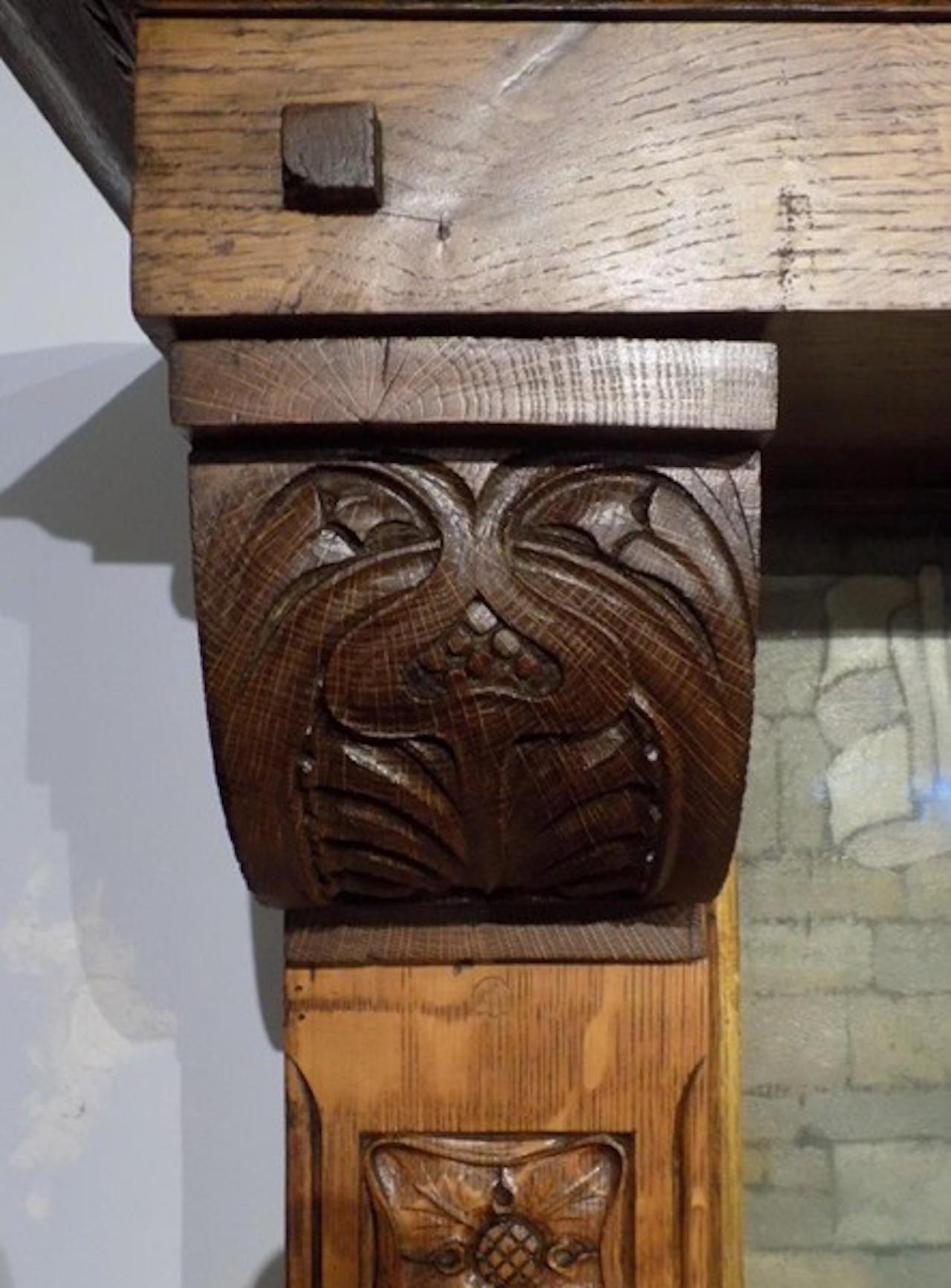 A magnificent Arts & Crafts Period oak fireplace probably by Edgar Wood For Sale 1