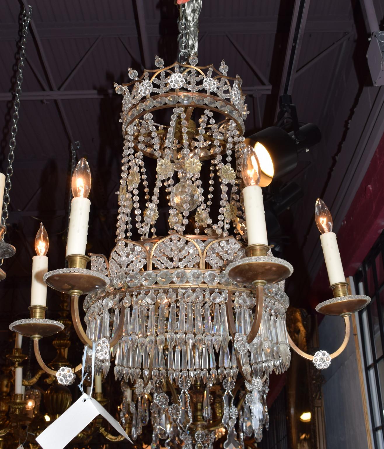 A superb silver over bronze and crystal Baltic chandelier. 6 lights.
Finland, circa 1900. 
Dimensions: Height 23 1/2