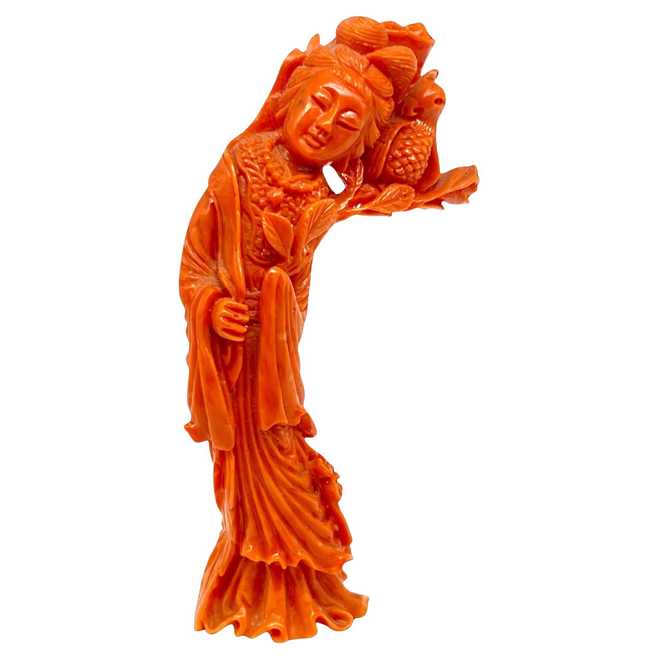 A Magnificent Chinese natural
Red Coral carving STATUE / FIGURINE of a beauty.

Late Qing Dynasty. 

The Beauty is carved from the one solid piece of natural red coral. Not dyed. 

The beauty is standing in flowing robes, her hair finely carved and
