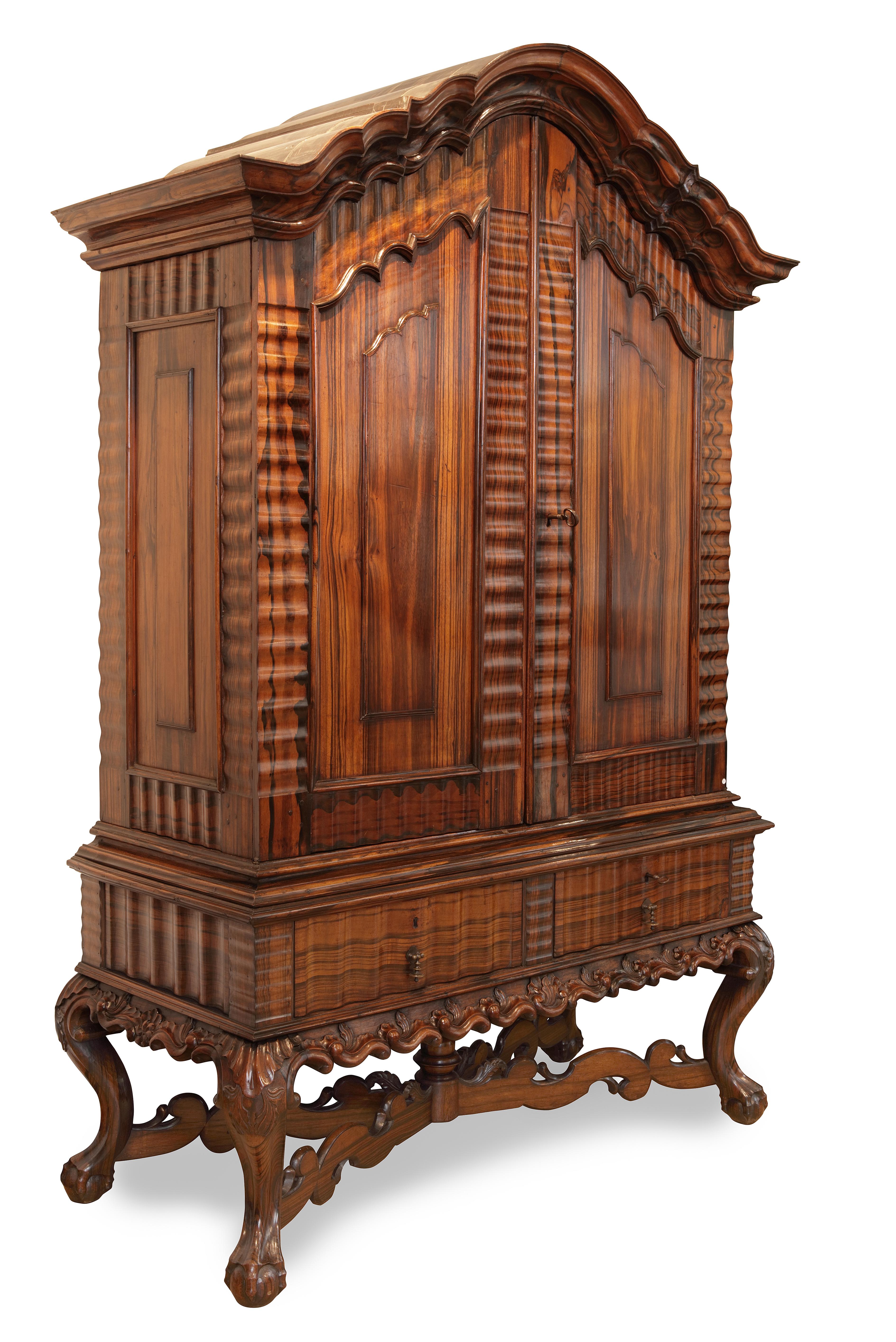 A magnificent Coromandel cabinet on stand Sri Lanka, mid-18th century

Measures: H 234 x W 147 x D 79 cm (can be taken apart)

The typical Dutch colonial cupboard with two doors, surmounted by an architectural stepped pediment and resting on a