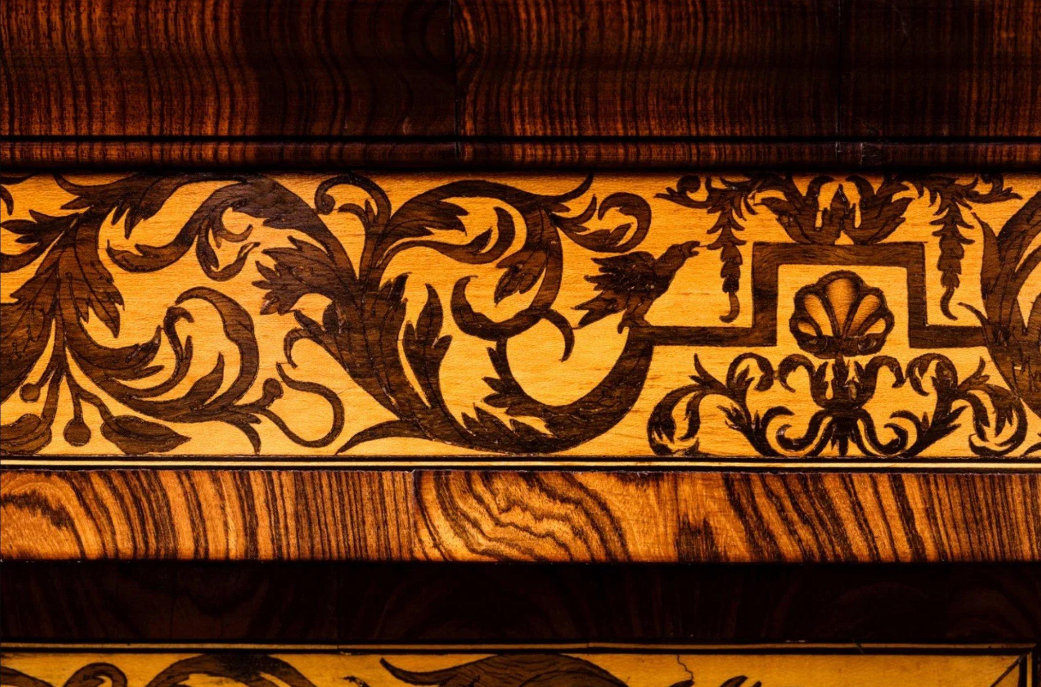 A magnificent Dutch marquetry cabinet on stand, by Jan van Mekeren (1658-1733) possibly made for William III and Mary of England

Amsterdam, circa 1687

The oak cabinet is decorated with 'arabesque' or 'seaweed' marquetry in Turkish walnut (Juglans