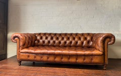 Magnifique canapé Chesterfield en cuir du début du 20e siècle