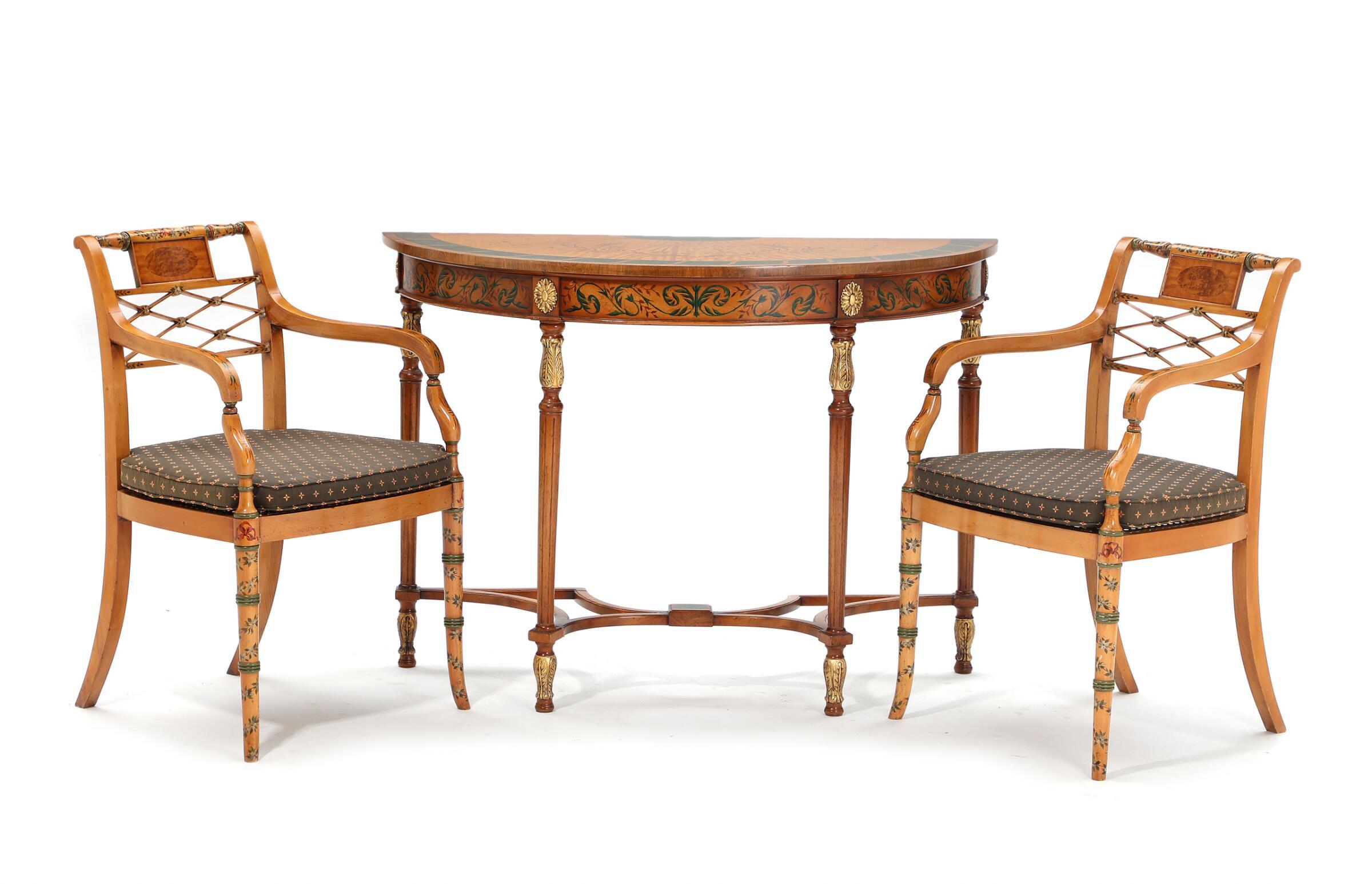 A magnificent pair of antique Sheraton style chairs date around the 1930ties. The chairs have cane seats and a loose pillow. The set is in very fine original condition.