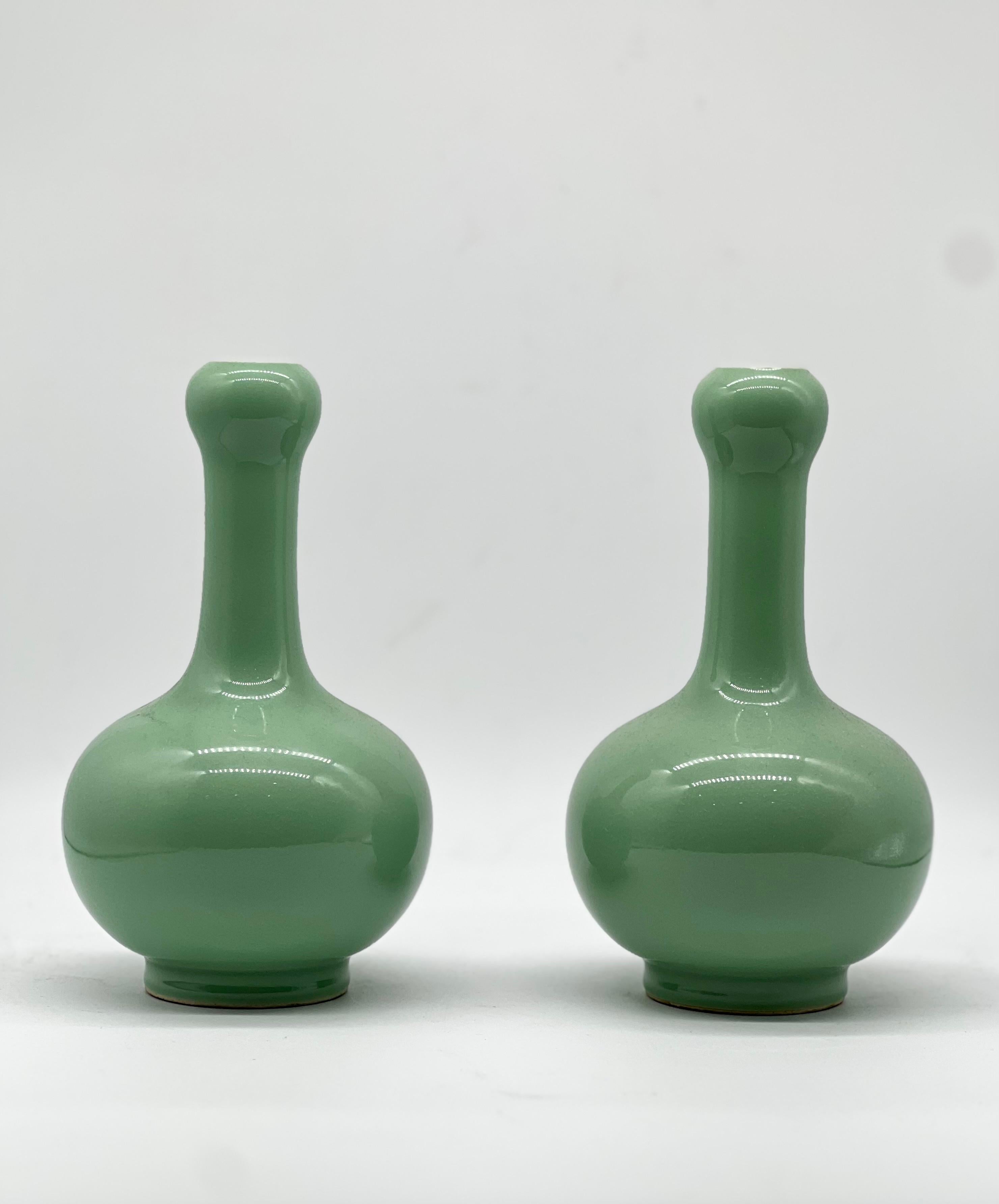 A Magnificent pair of Chinese Apple Green Monochrome Vases. Signed  4