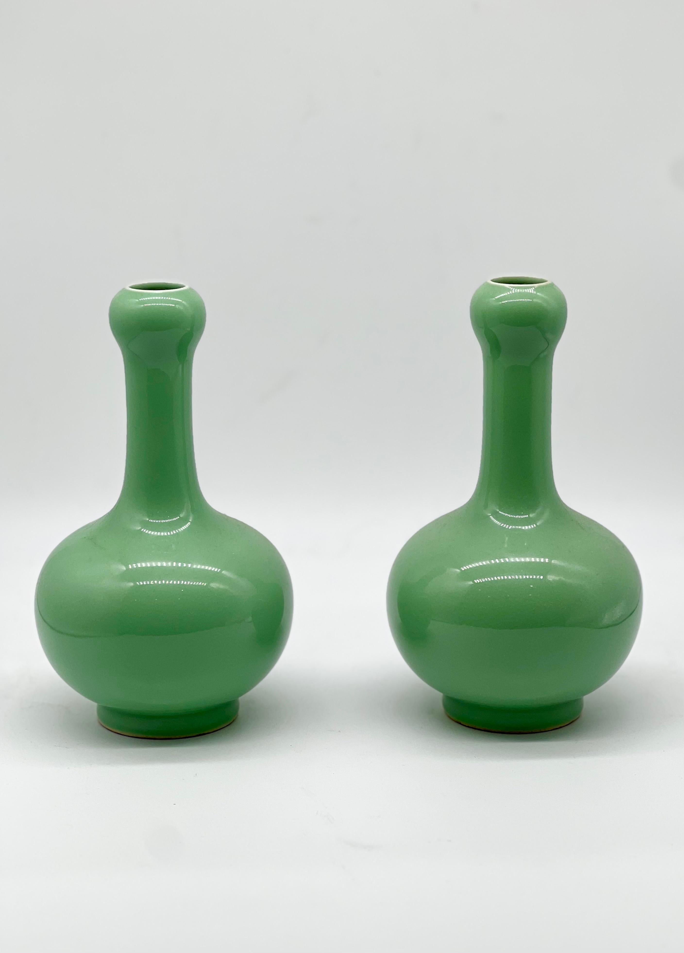 A Magnificent pair of Chinese Apple Green Monochrome Vases. Signed  5