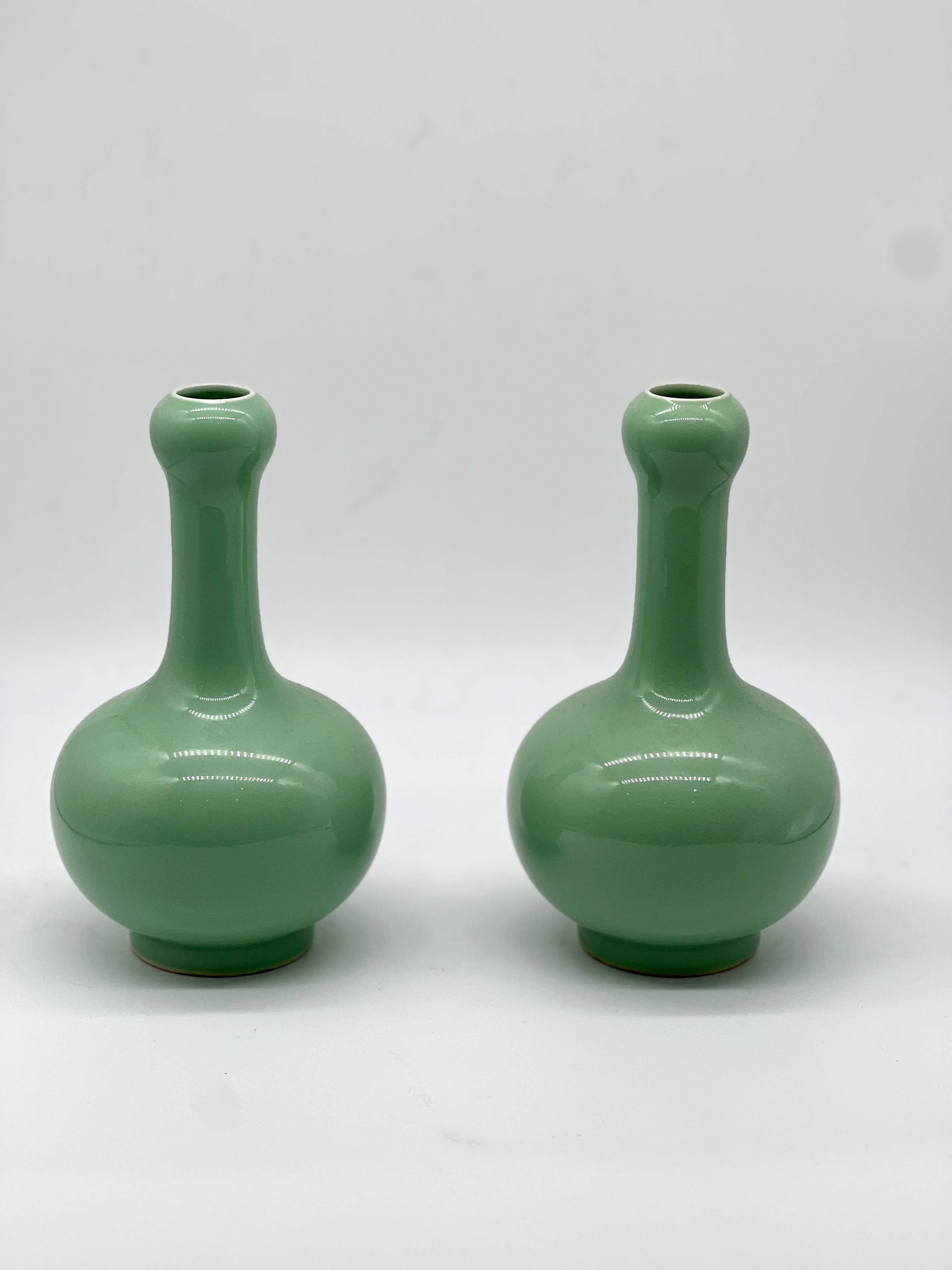A Magnificent pair of Chinese Apple Green Monochrome Vases. Signed  1