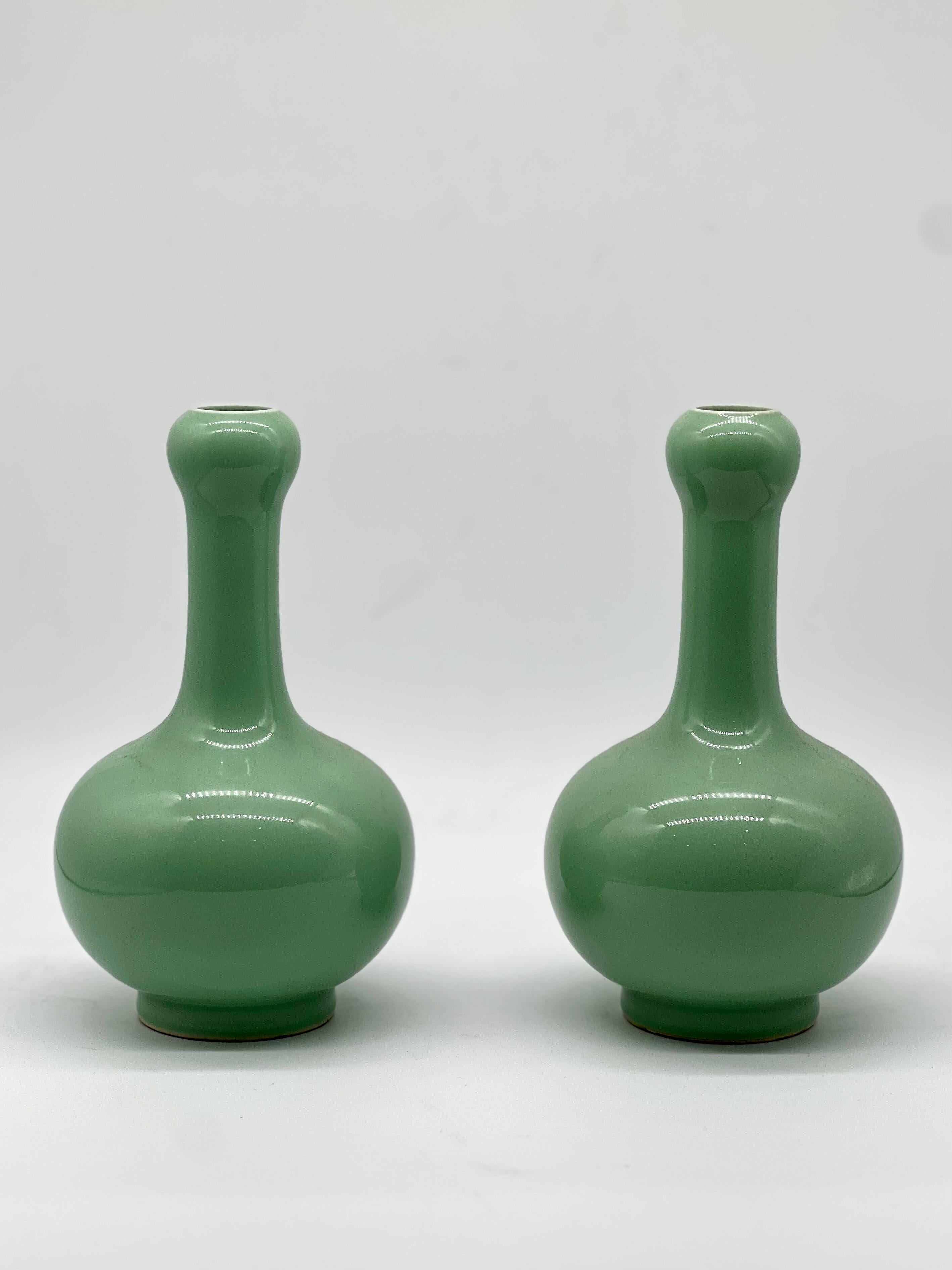 A Magnificent pair of Chinese Apple Green Monochrome Vases. Signed  2