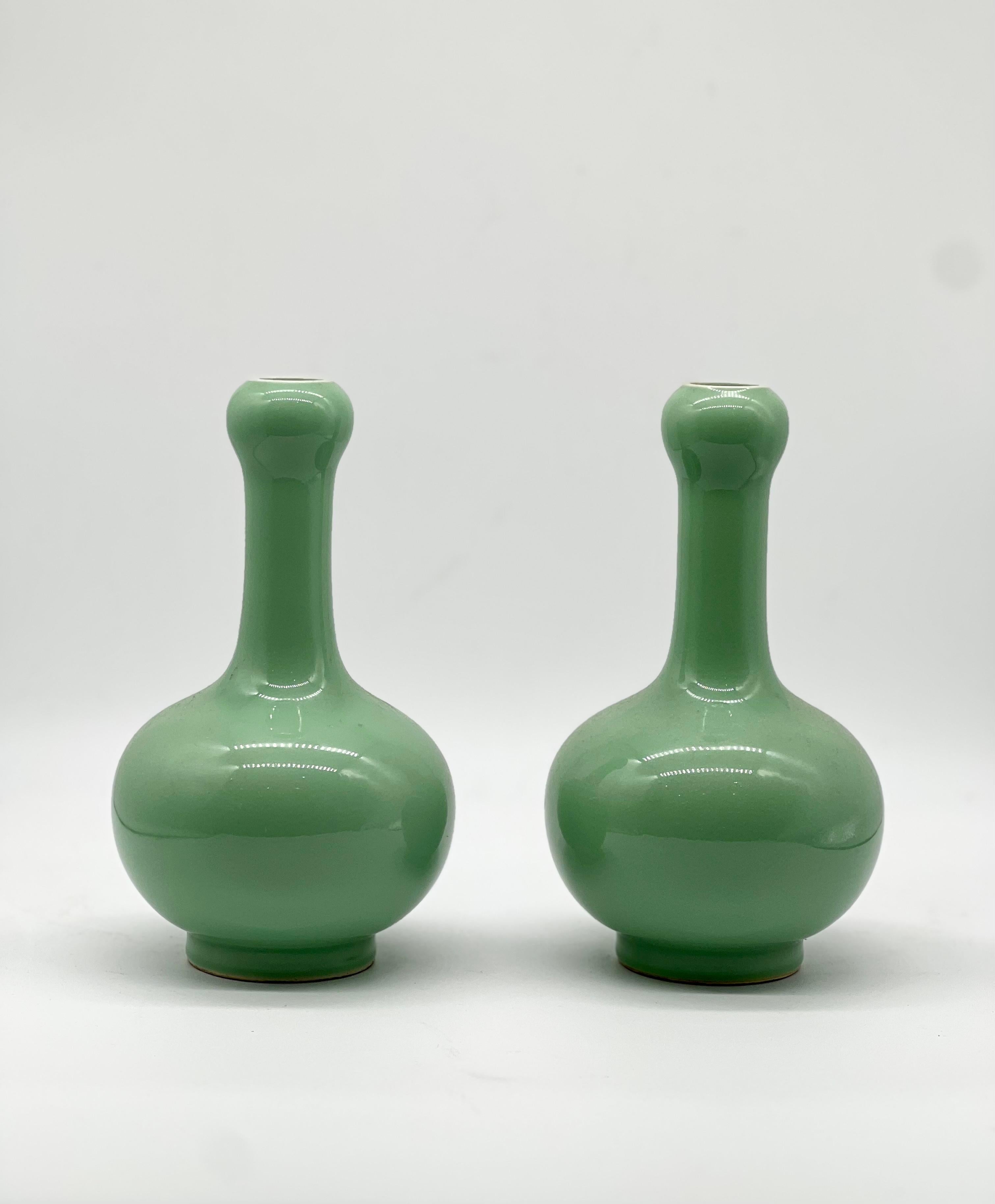 A Magnificent pair of Chinese Apple Green Monochrome Vases. Signed  3