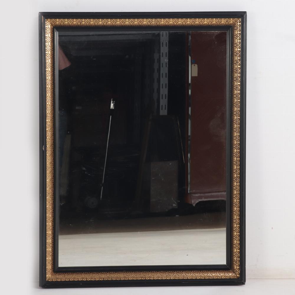 A magnificent pair of French black and gold mirrors, 19th C. In Good Condition For Sale In Philadelphia, PA