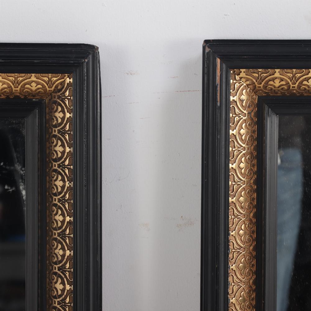 19th Century A magnificent pair of French black and gold mirrors, 19th C. For Sale