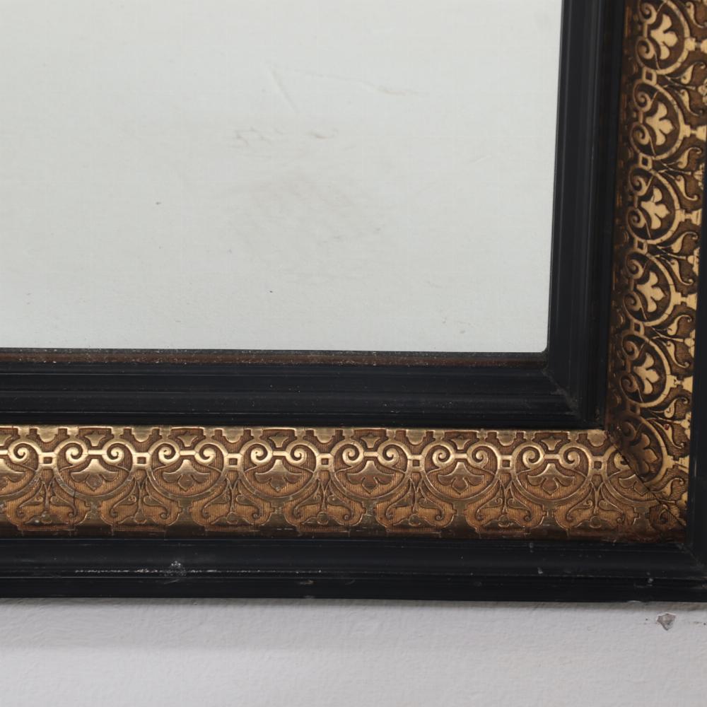 Wood A magnificent pair of French black and gold mirrors, 19th C. For Sale