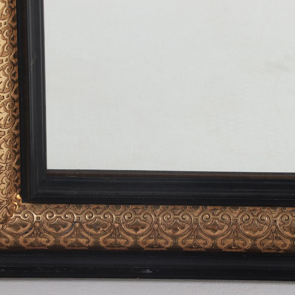 A magnificent pair of French black and gold mirrors, 19th C. For Sale 1