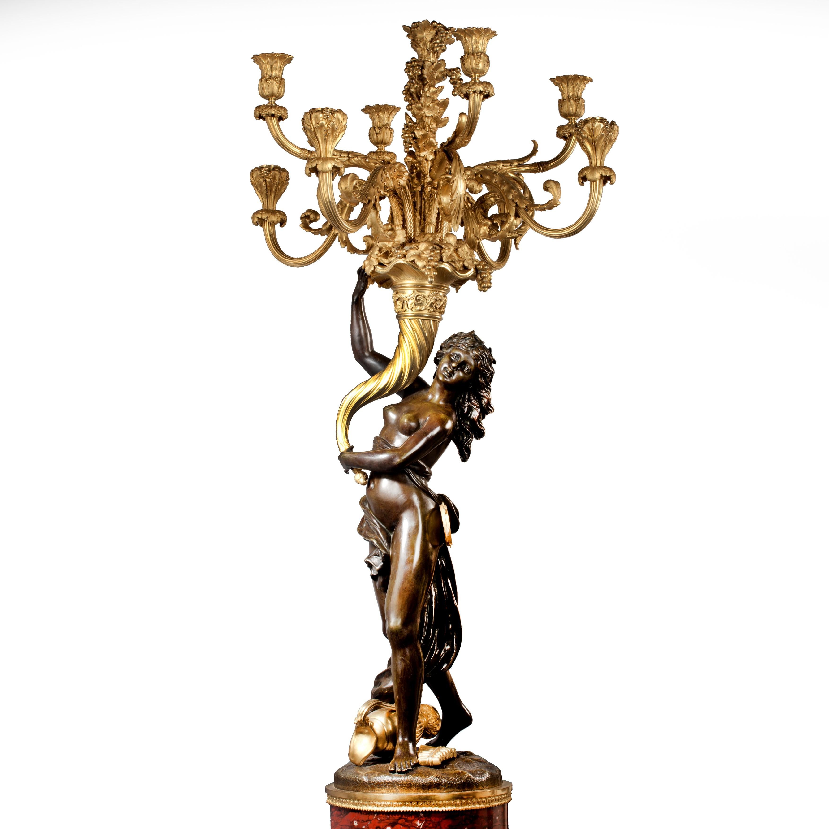 Français Magnifique paire de candélabres Louis XVI d'après Clodion en vente