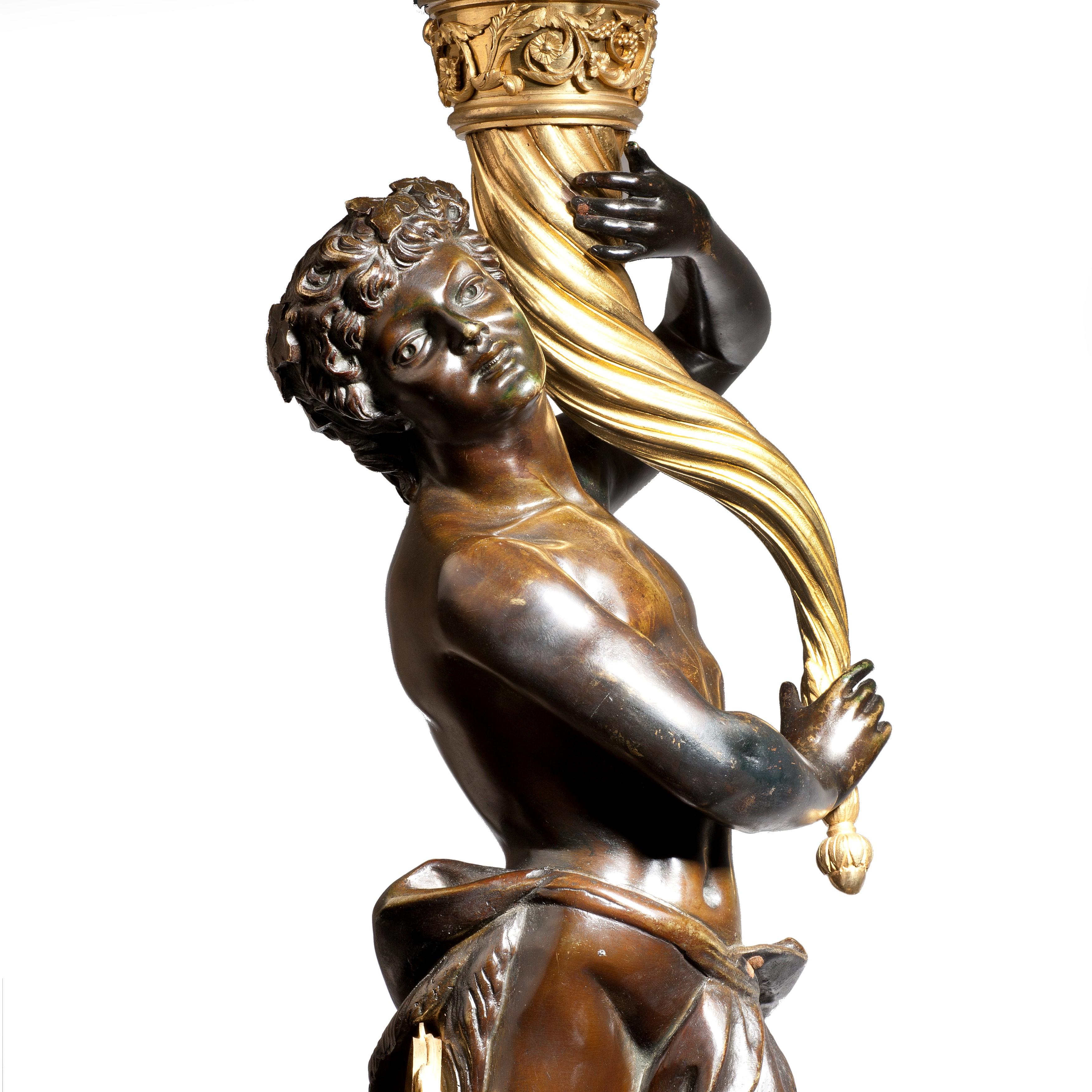 Bronze Magnifique paire de candélabres Louis XVI d'après Clodion en vente
