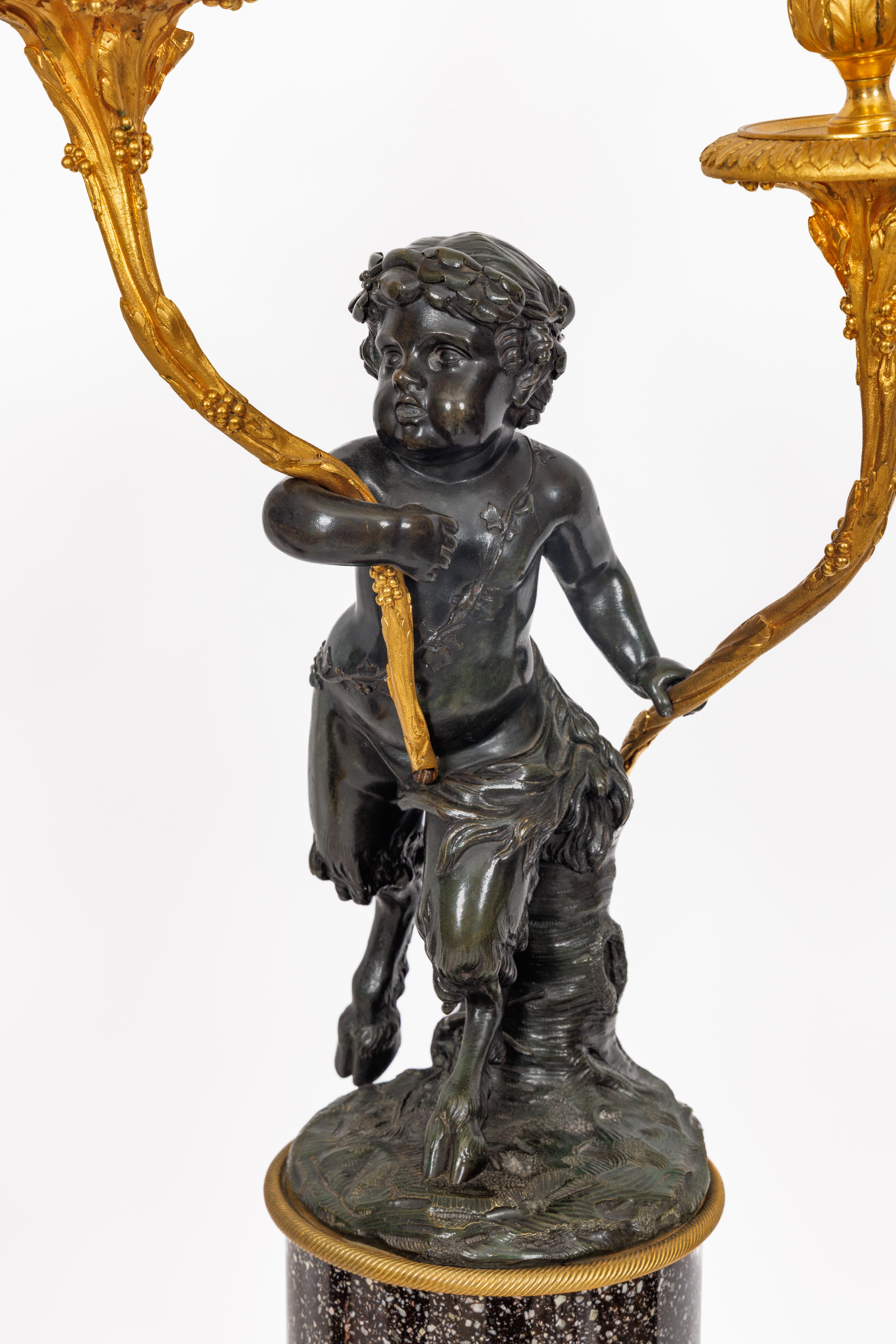 Magnifique paire de candélabres en bronze doré de style Louis XVI sur bases en porphyre en vente 9
