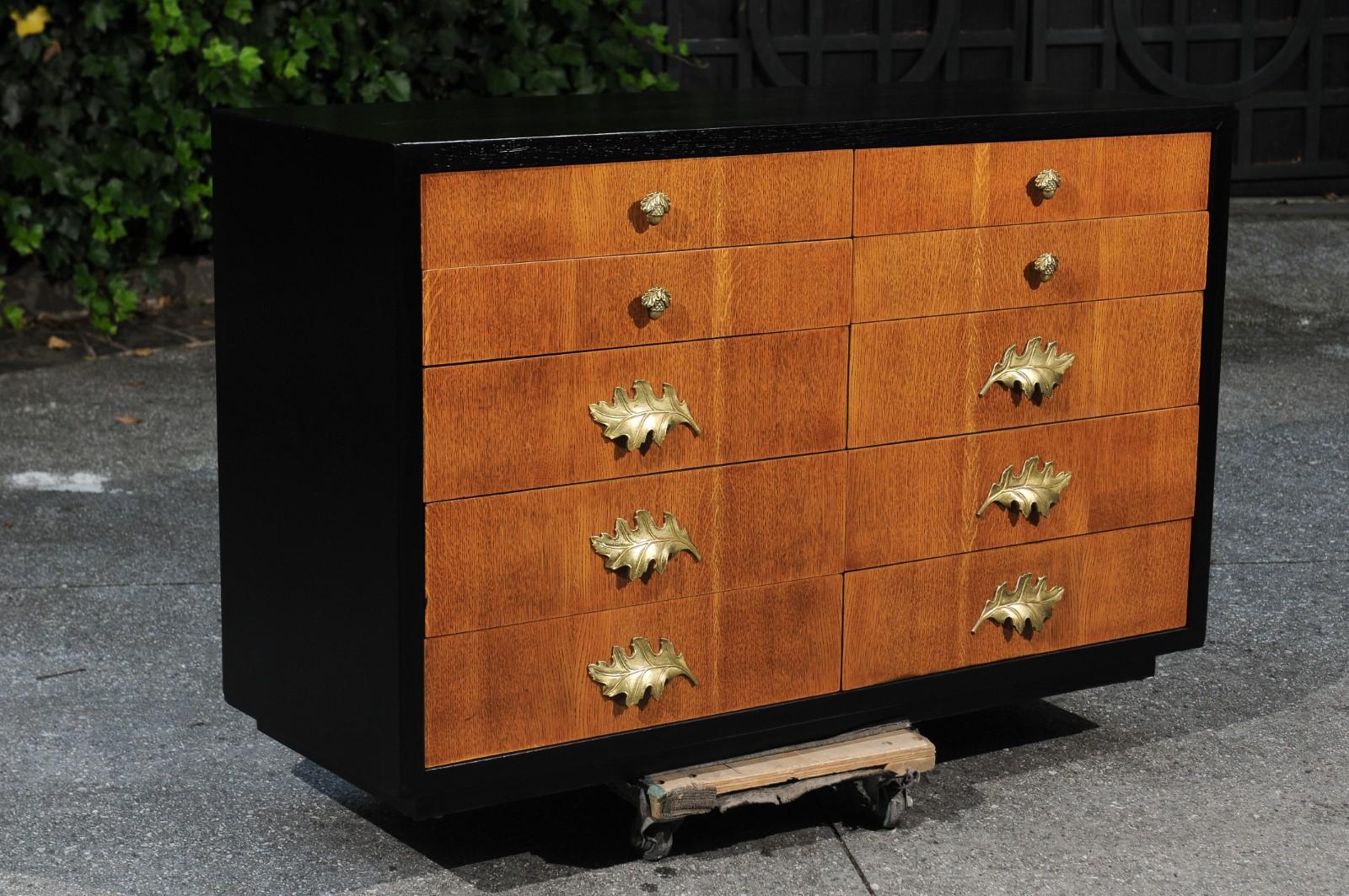 A breathtaking rare commode by Lorin Jackson for Grosfeld House. This stunning example, model number 3955, can be found in the August, 1947 Grosfeld House catalog. Exceptionally crafted Cerused oak case construction finished in Ebony, with drawer