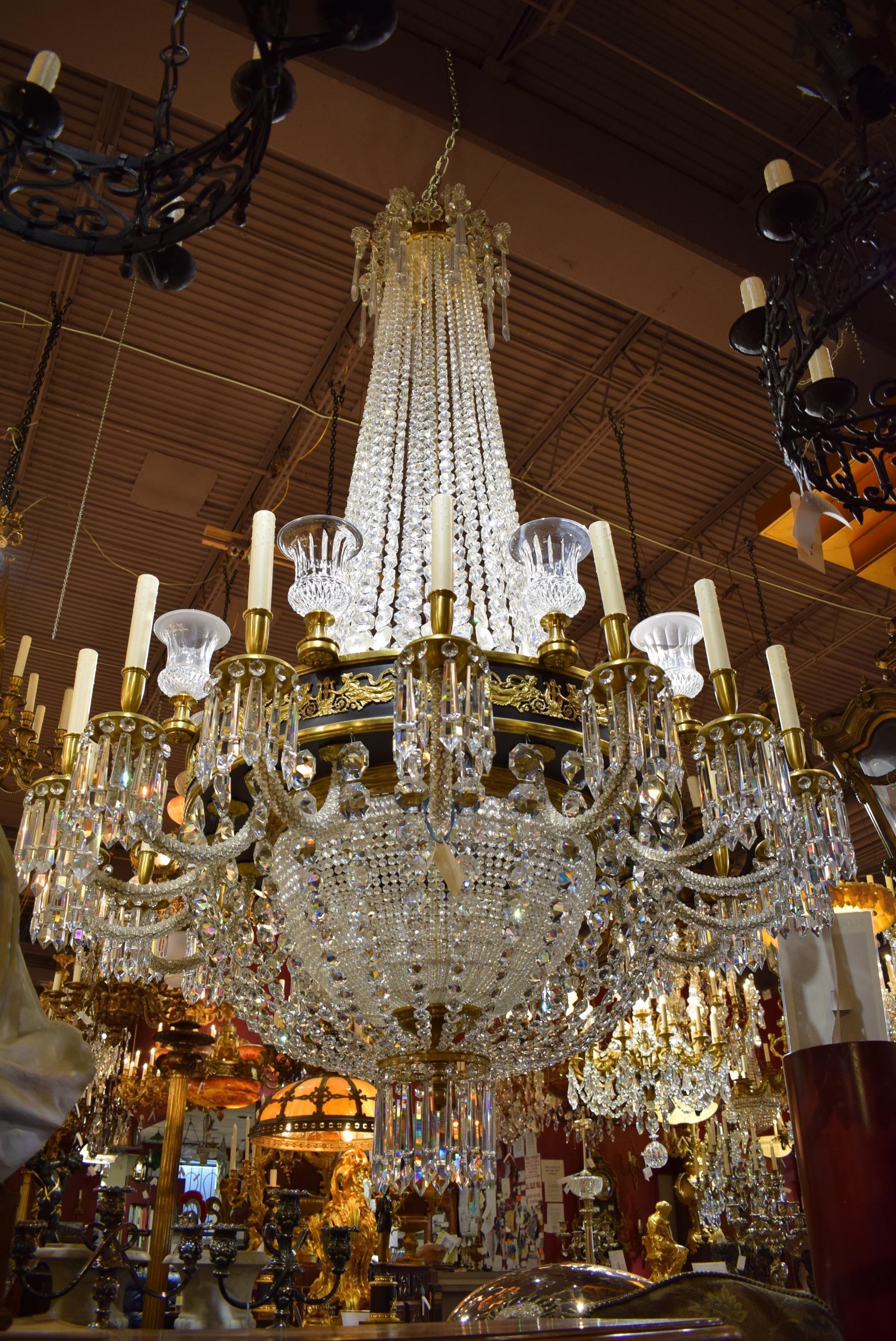 A magnificent Swedish gilt bronze and crystal chandelier. Sweden circa 1900. Also, in excellent condition. 
Dimensions are 116