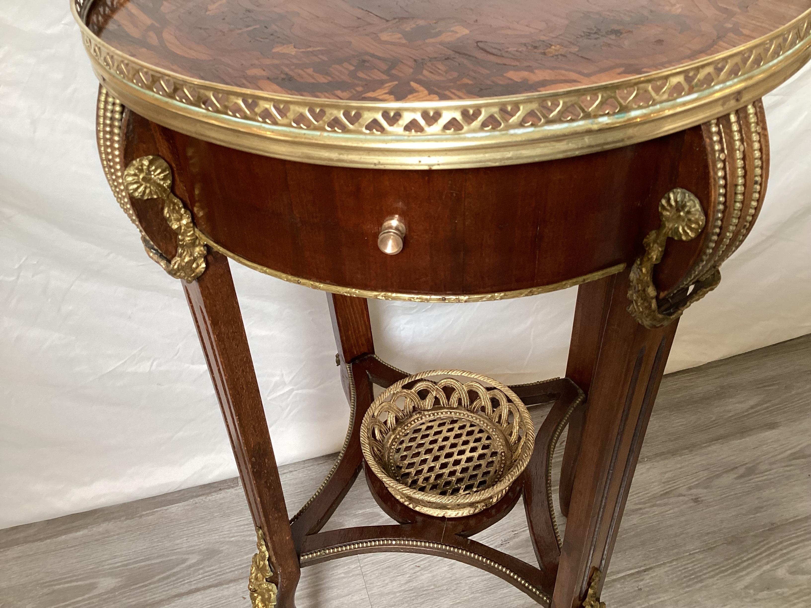 Mahogany and Tulip Wood Inlaid Gilt Mounted Gallery Table In Good Condition In Lambertville, NJ