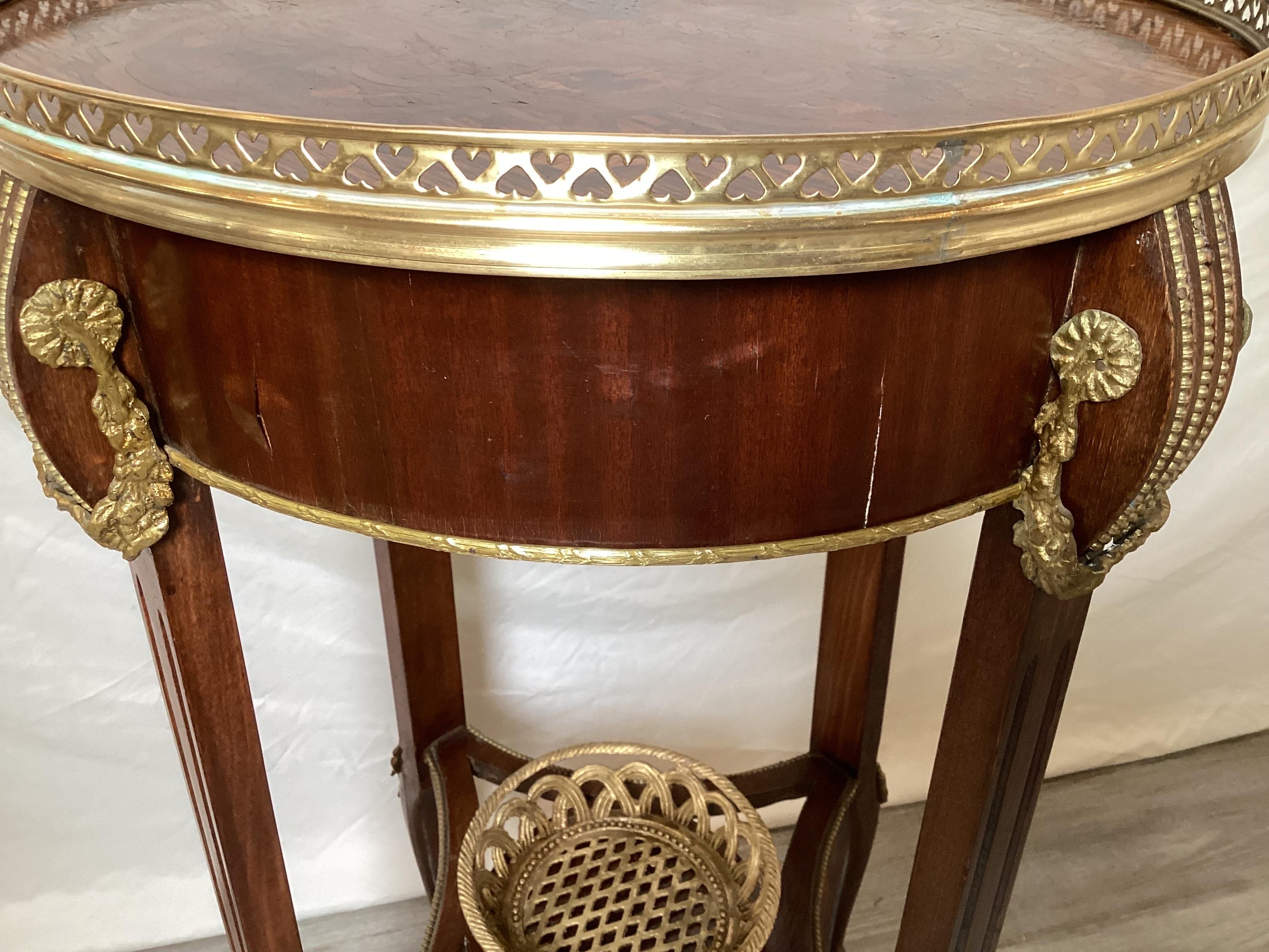 Bronze Mahogany and Tulip Wood Inlaid Gilt Mounted Gallery Table