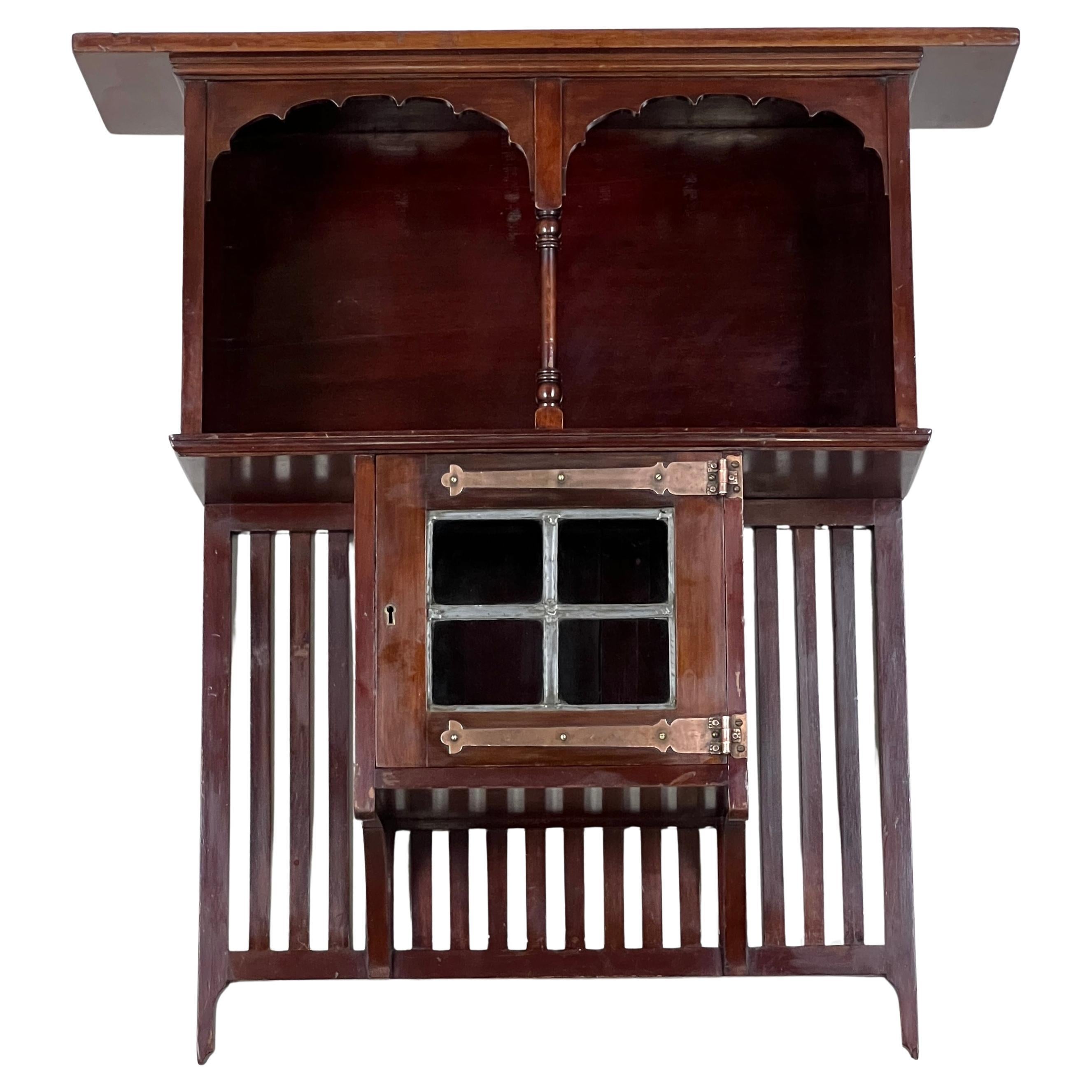 A Mahogany Arts And Crafts Wall Shelf Cabinet