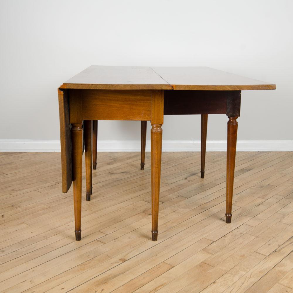 Mid-20th Century A mahogany drop leaf table. 1950's For Sale