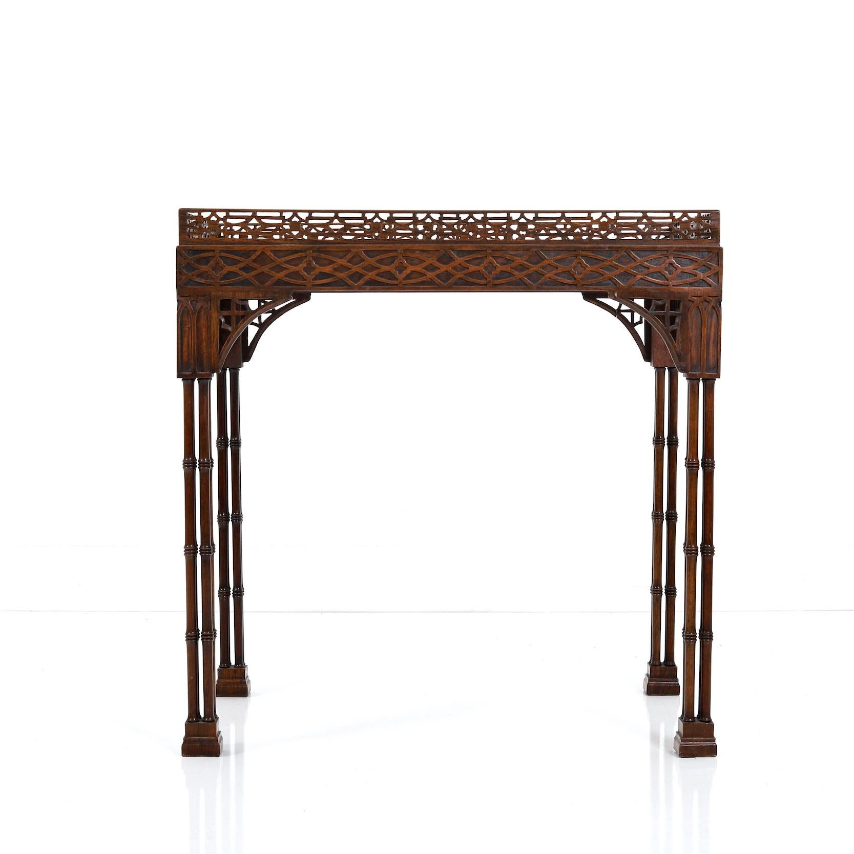 Vagabond presents a mahogany tea table

England, Circa 1900

” A really smart looking, quality mahogany tea or silver table in the 18th century Chinese chippendale manner “.