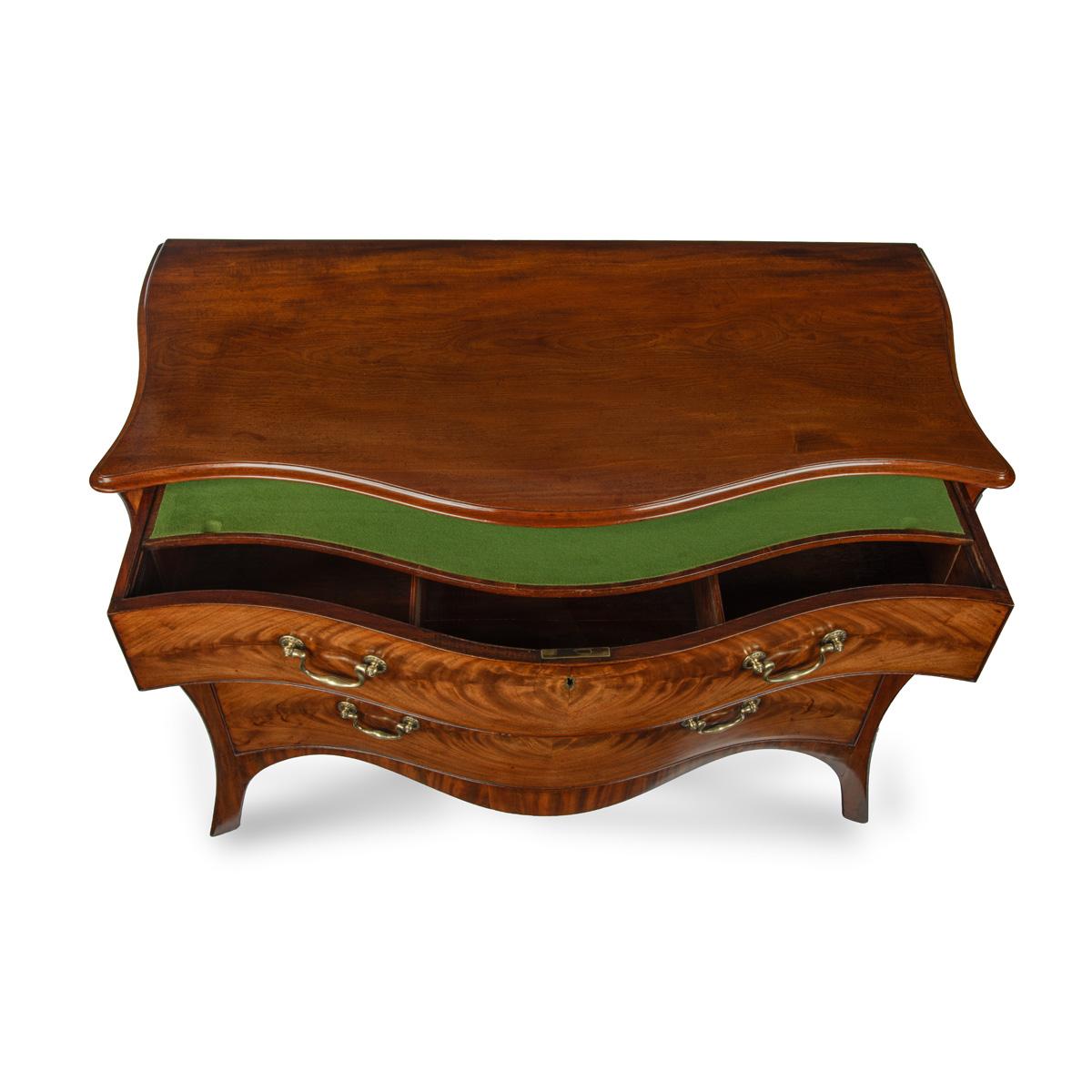 English A mahogany three-drawer serpentine chest of drawers, attributed to Henry Hill For Sale