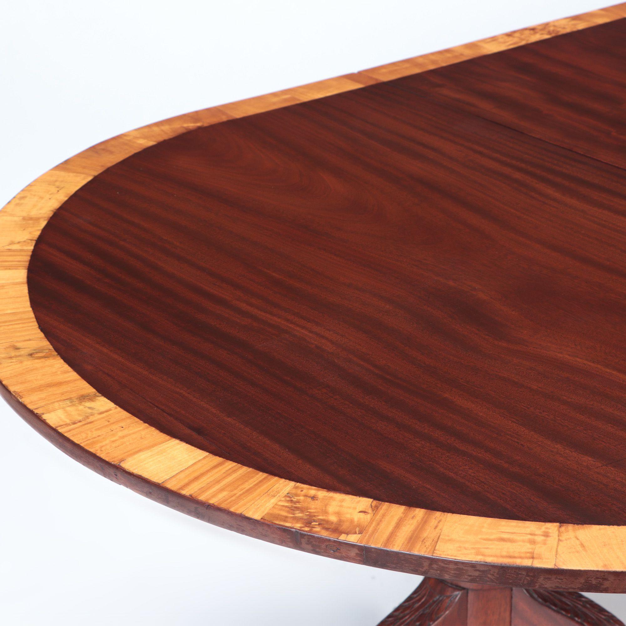 English Mahogany Triple Pedestal Dining Table with Banded Top. England, circa 1910