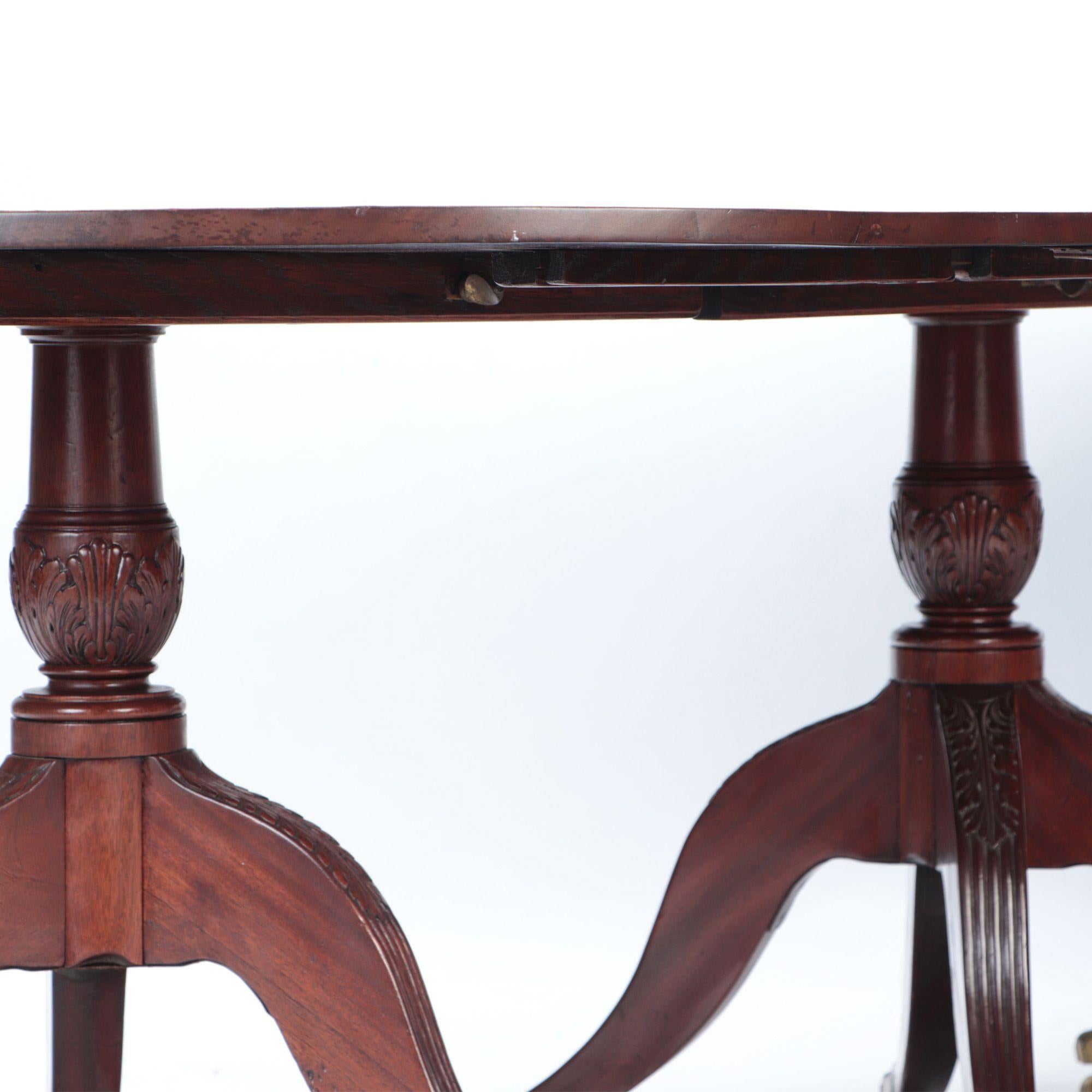 Mahogany Triple Pedestal Dining Table with Banded Top. England, circa 1910 In Good Condition In Philadelphia, PA