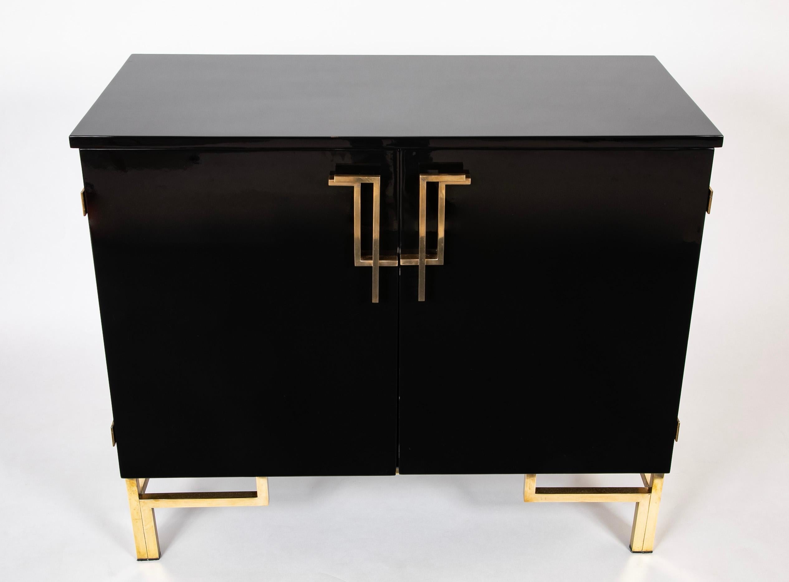 Mid-Century Modern A Maison Jansen Black Lacquer Cabinet with Gilded Brass Accents For Sale